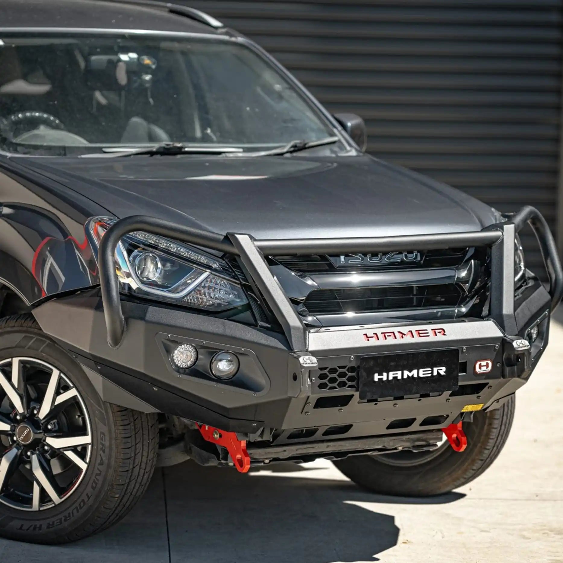 Left side view of Isuzu MU-X 2016–2020 equipped with Hamer King Series Plus Bull Bar, showcasing full bumper replacement design, winch compatibility, and sleek Australian engineering.