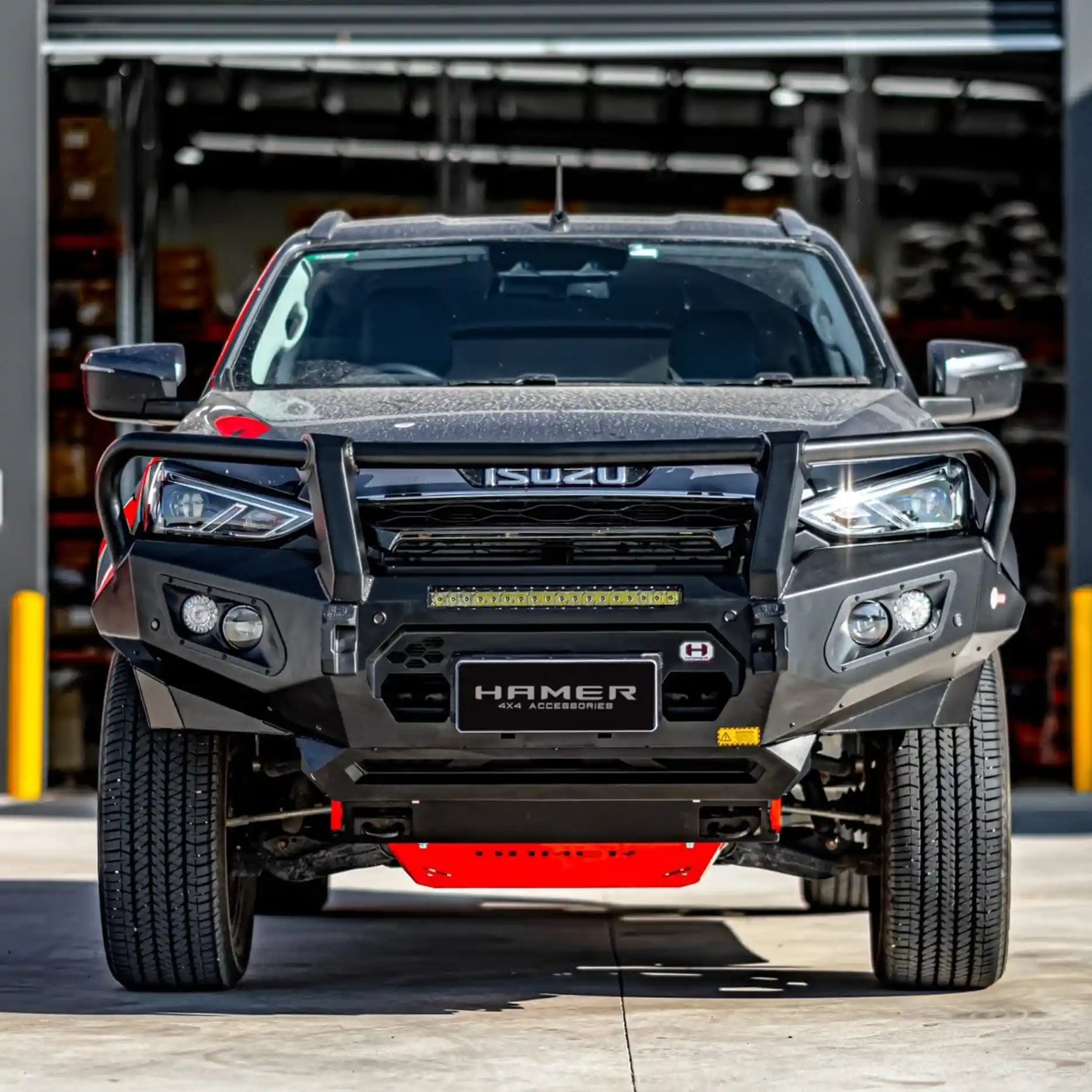 Front angle shot of Isuzu MU-X 2021–2024 equipped with Hamer King Series Plus Bull Bar, featuring winch compatibility up to 12,000 lb, sleek Australian design, and superior off-road protection.