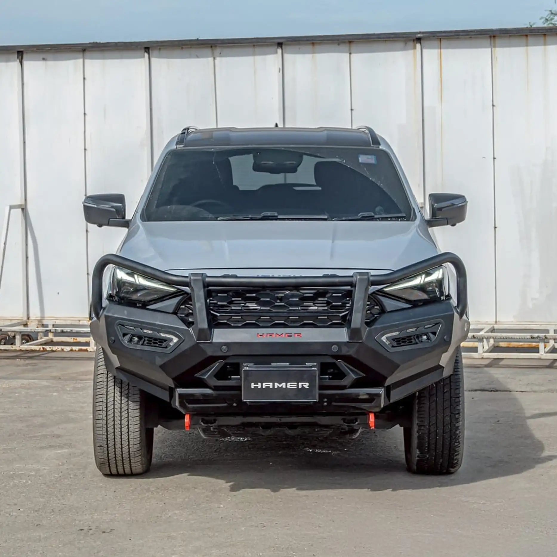 Front view of Isuzu MU-X (2025 – Present) fitted with Hamer Atlas Plus Series Bull Bar, showing rugged matte black finish, ADR compliance, and integrated LED lighting system for maximum safety and style.