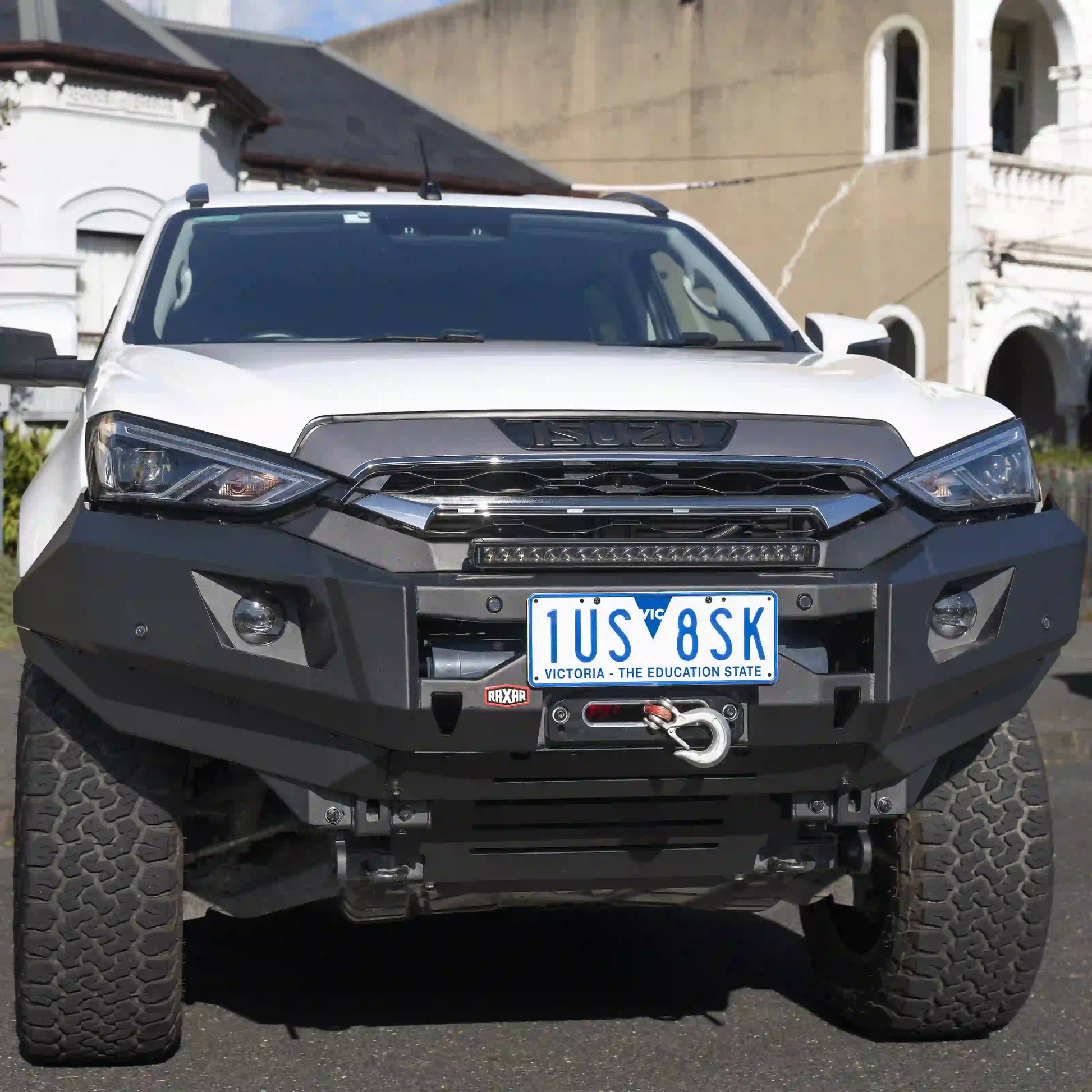 isuzu mux no loop raxar bull bar front on vehicle designed with adr compliance recovery points full winch compatibility and a durable matte black powder coated finish this premium 4wd bull bar delivers strength protection and airflow efficiency making it the ideal upgrade for australian touring worksites and everyday driving available from elevated 4x4