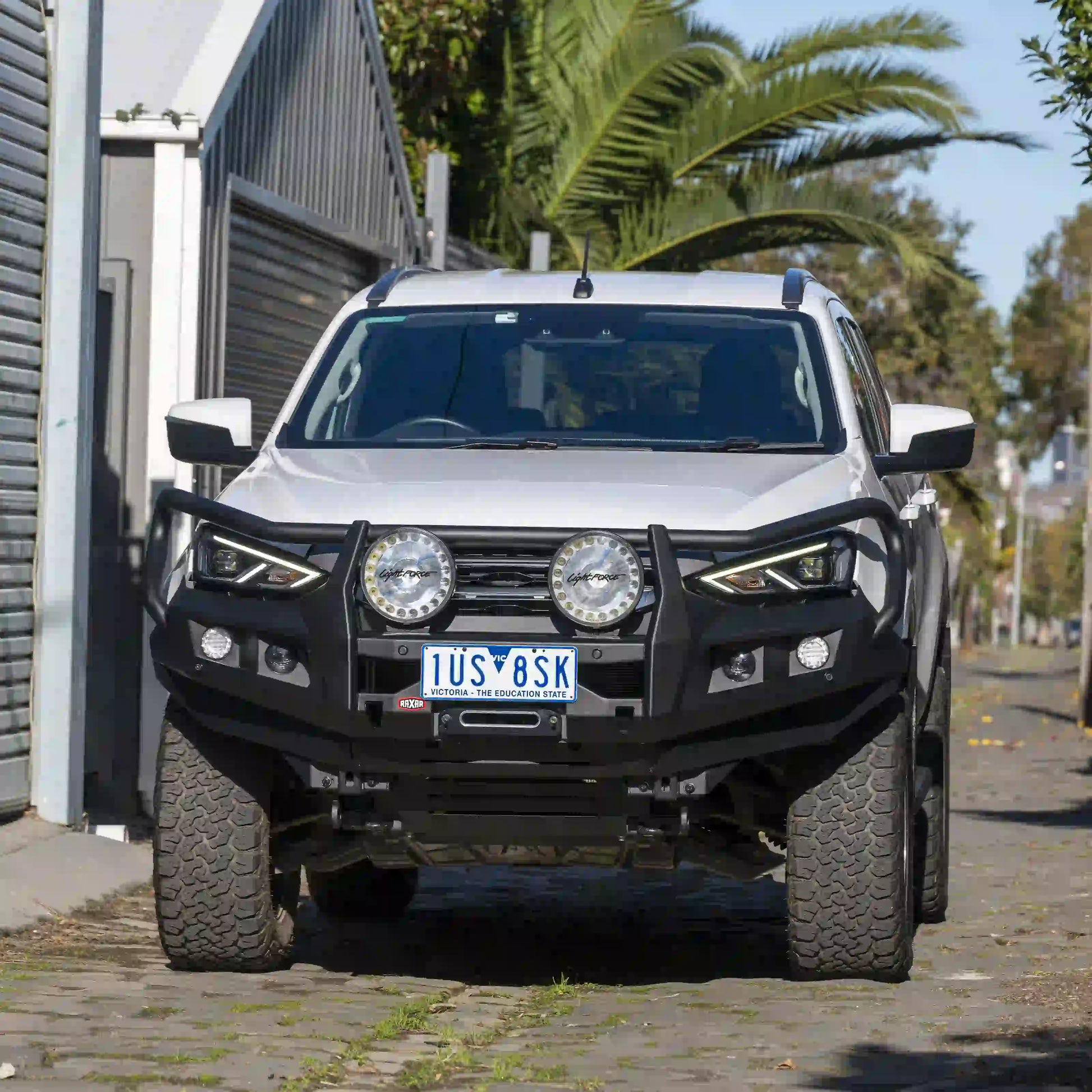 isuzu mux raxar bull bar front on vehicle designed with adr compliance recovery points winch compatibility and matte black durability this premium 4wd accessory delivers safety strength and offroad capability for australian touring worksite and daily driving available nationwide from elevated 4x4