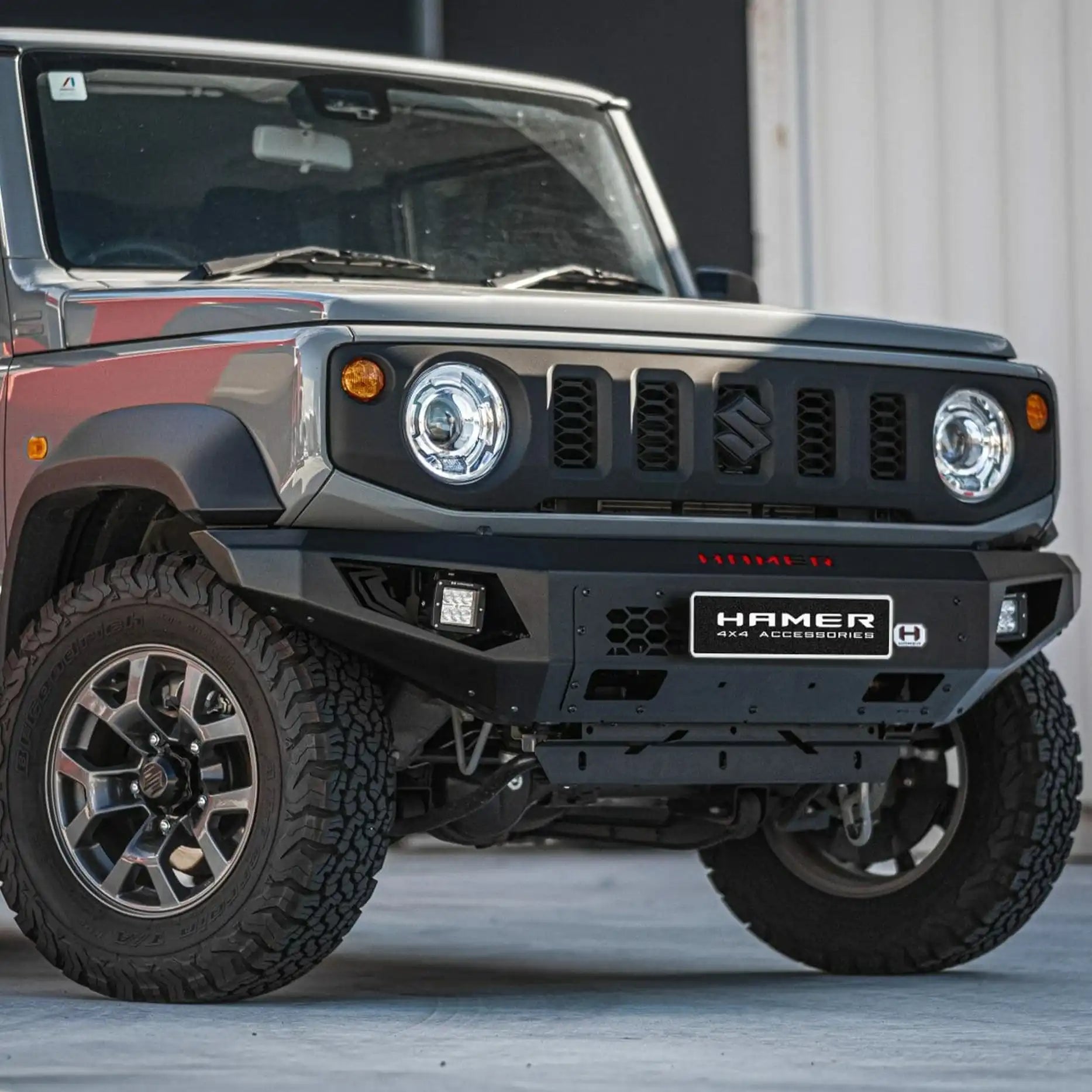Left side of Suzuki Jimny JB74W (2018–Present) fitted with Hamer King Series Bull Bar, compact off-road protection with style.