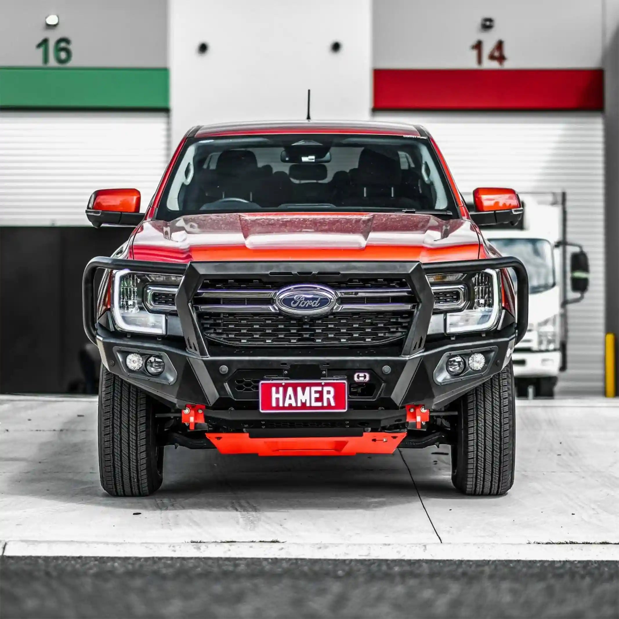 Front installed view of Hamer 4x4 King Series Plus Bull Bar on Ford Ranger (2022–Present), showing matte black finish, LED lights, and ADR compliance.
