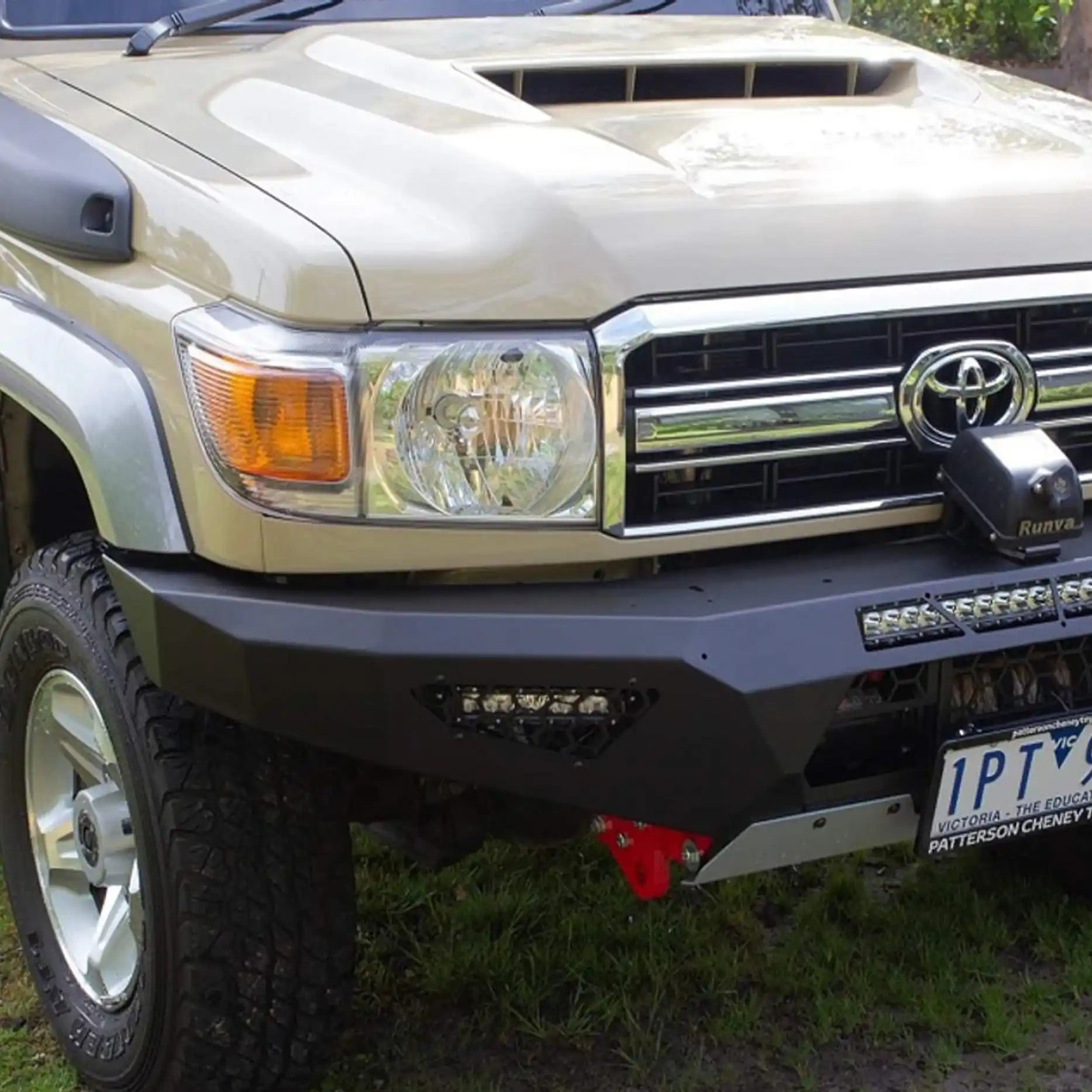 Right-side view of the Offroad Animal Predator Bull Bar fitted to a Toyota Land Cruiser 79 Series, showcasing reinforced tow hooks, bold lines, and precision powder coating. Professionally fitted by Elevated 4x4, it’s the ultimate protection upgrade for rugged outback drives and Hunter region 4WD builds.