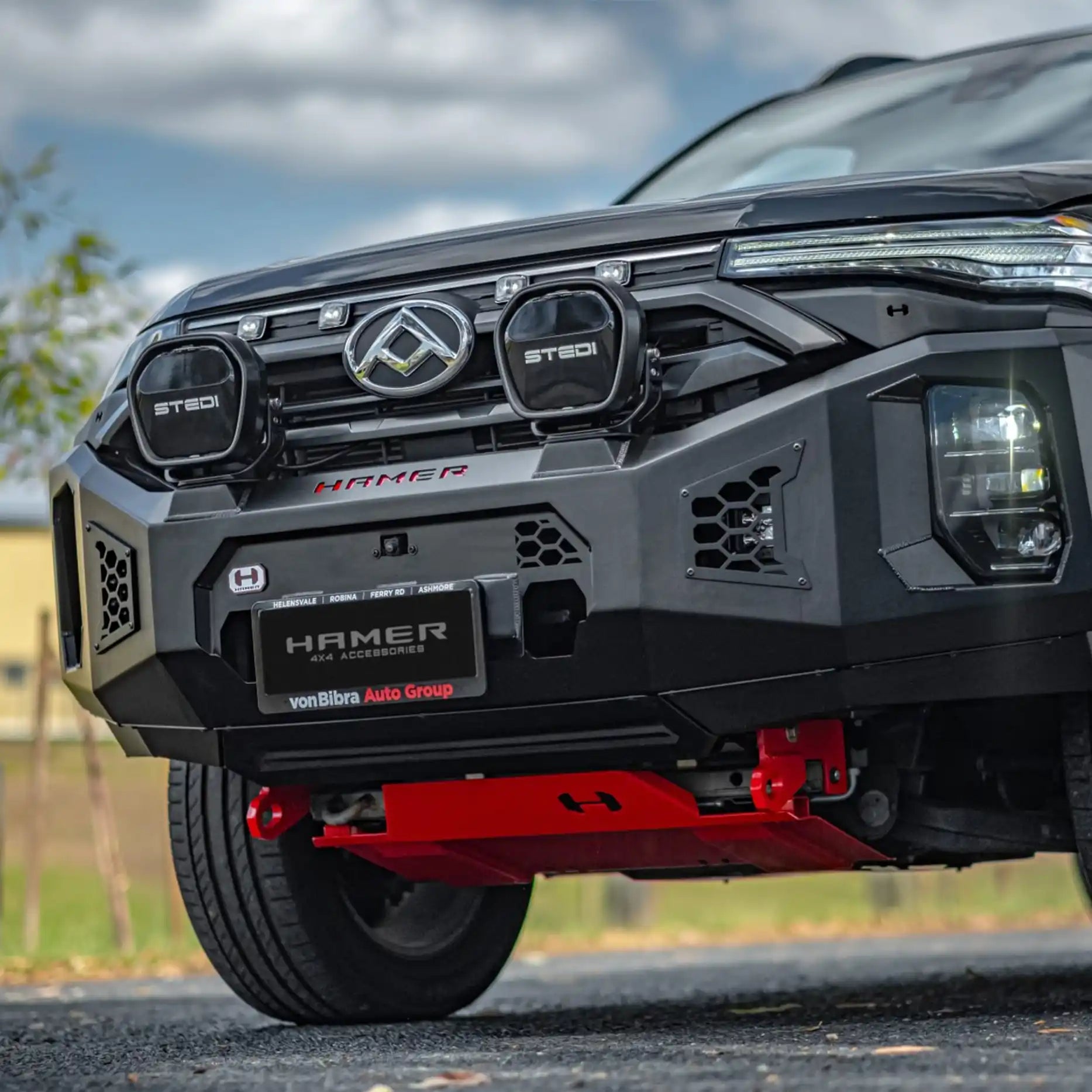 Right side profile of LDV T60 Max Plus with Hamer King Series Bull Bar, highlighting strong bumper replacement design and LED fog lamps.