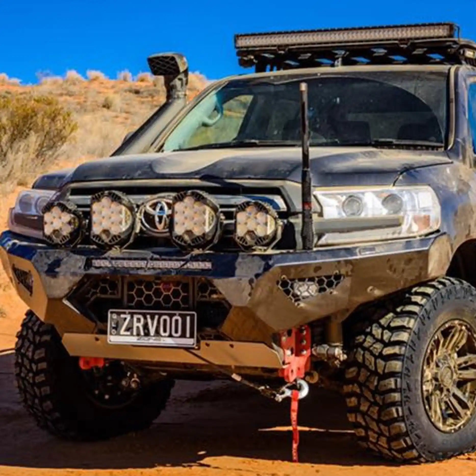 Close-up left detail of the Offroad Animal Predator Bull Bar on a Toyota Land Cruiser 200 Series, showcasing its mesh infill, recovery points, and light mounting options. Expertly fitted by Elevated 4x4, it enhances off-road performance and rugged styling for vehicles around Rutherford and Central Coast.