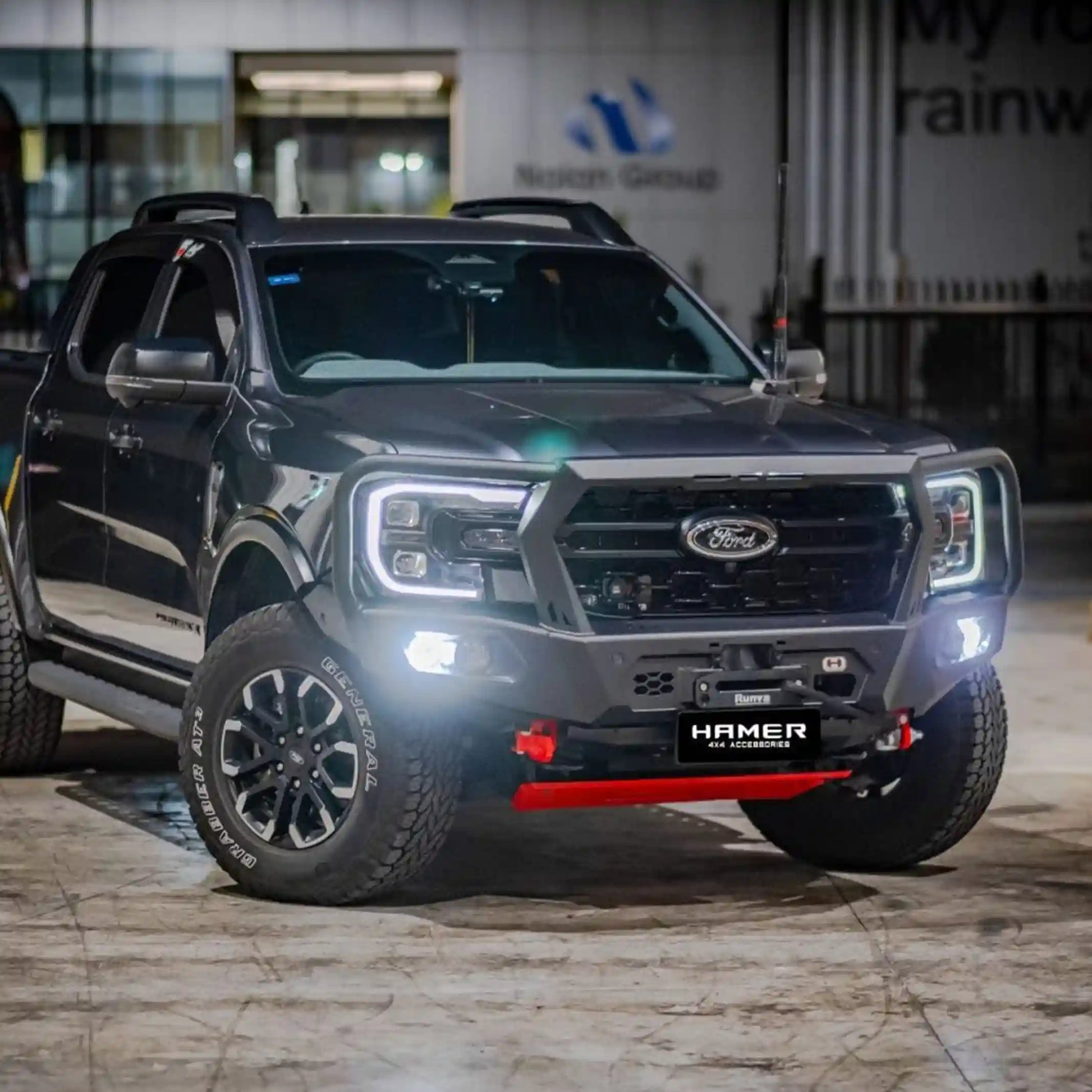 Left installed view of Hamer 4x4 King Series Plus Bull Bar on Ford Ranger (2022–Present), featuring ADR compliance, mounting points for lights, and rated recovery points.