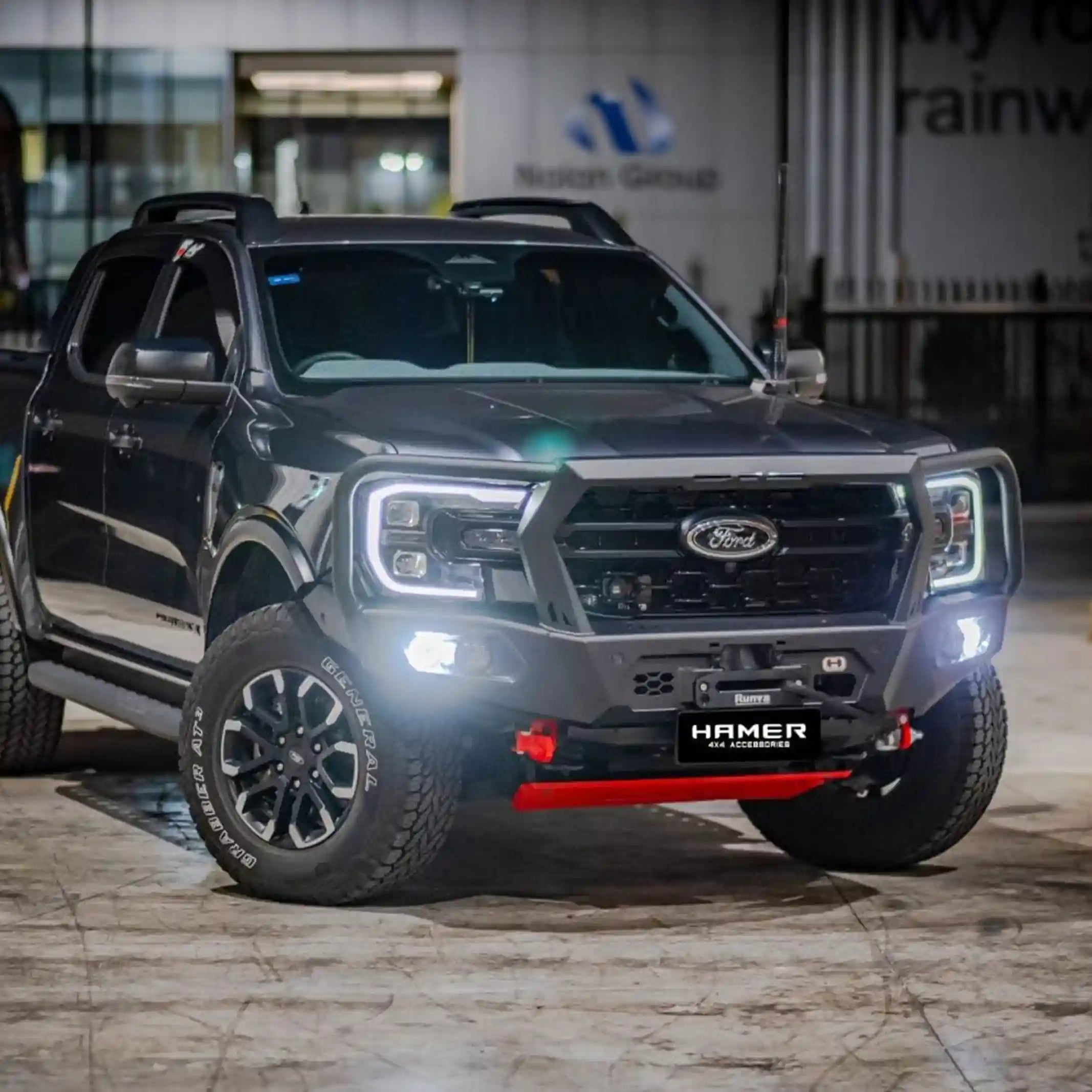 Left installed view of Hamer 4x4 King Series Plus Bull Bar on Ford Ranger (2022–Present), featuring ADR compliance, mounting points for lights, and rated recovery points.