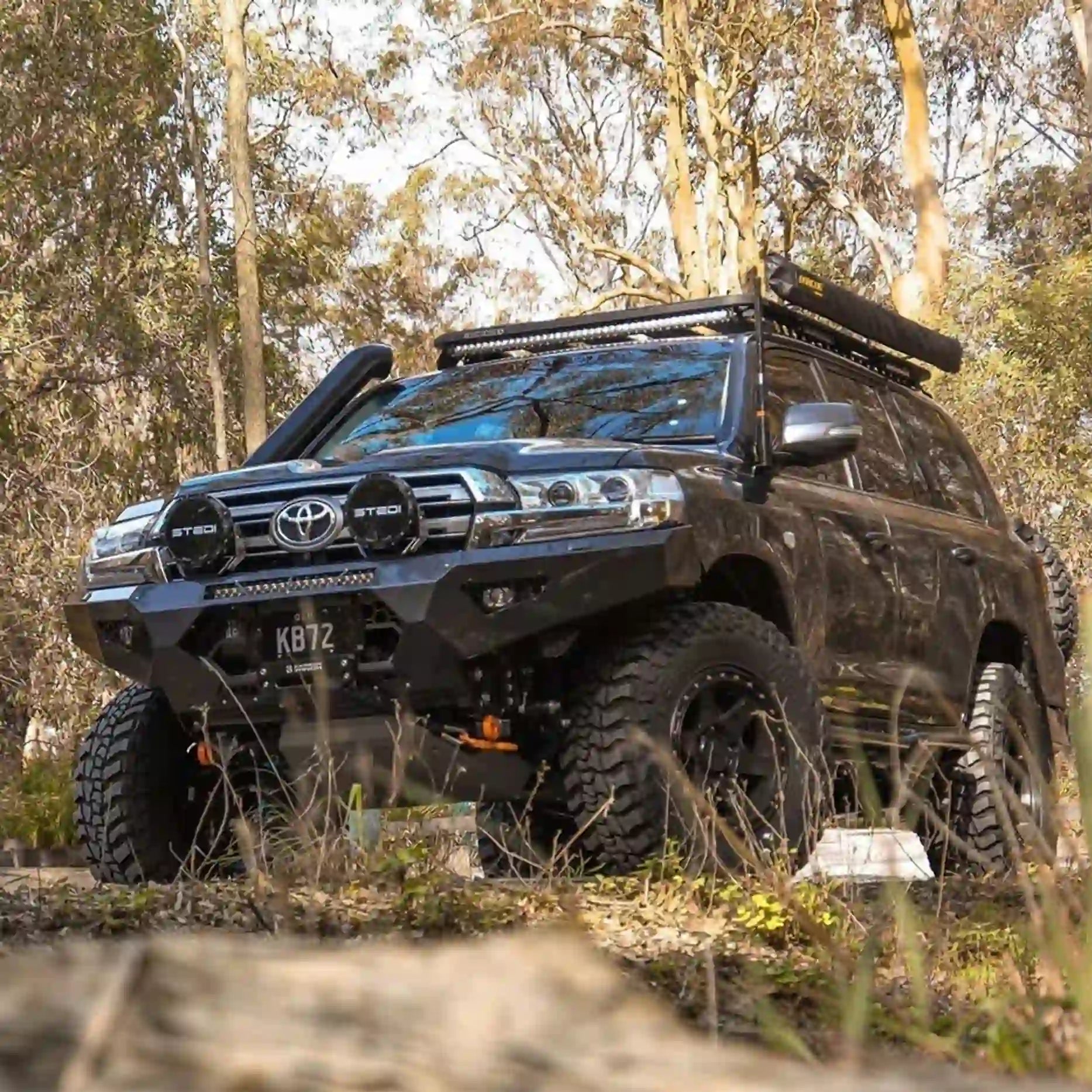 Left side profile of the Offroad Animal Predator Bull Bar installed on a Toyota Land Cruiser 200 Series, showing precision fitment, wing reinforcement, and sensor compatibility. Fitted by Elevated 4x4, this premium bar combines sleek design and strength for serious off-roaders across Port Stephens and the Hunter region.