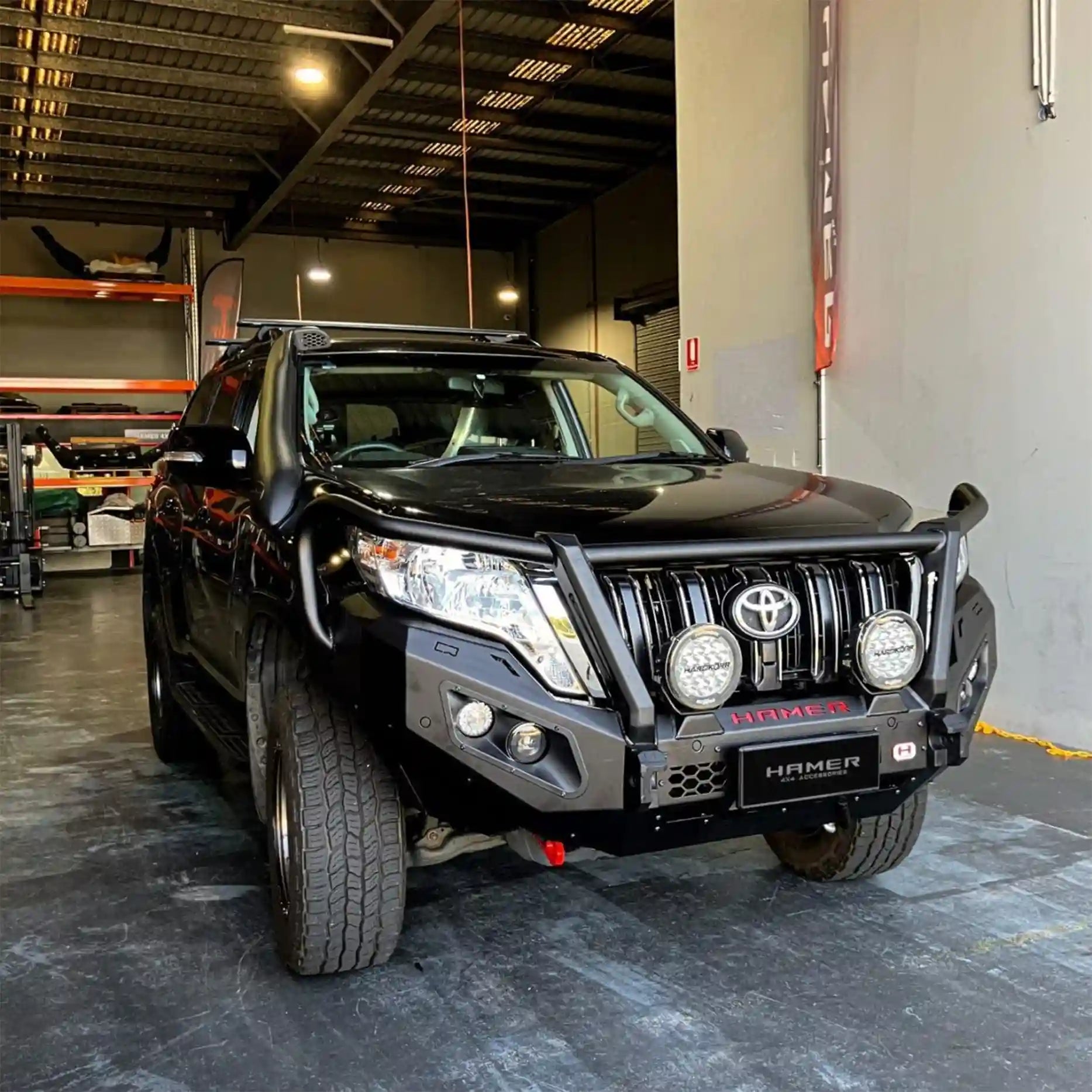 Left side view of Toyota Landcruiser Prado 150 Bull Bar (2013–2017) in matte black by Hamer King Plus, built tough from 3mm steel.