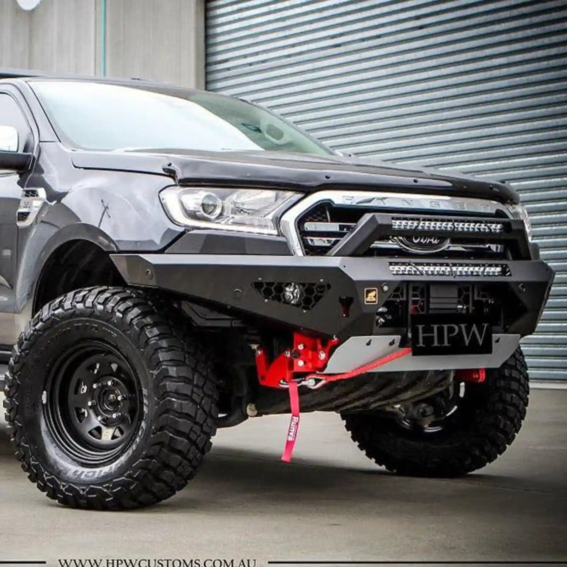 Product-only display of the Offroad Animal Predator Bull Bar finished in durable matte black, designed for the Ford Ranger PX2. Featuring high-lift jack points, winch compatibility, and stealth LED light bar integration, this 4WD accessory from Elevated 4x4 blends strength, airflow, and style for drivers exploring Australia’s toughest off-road terrains.