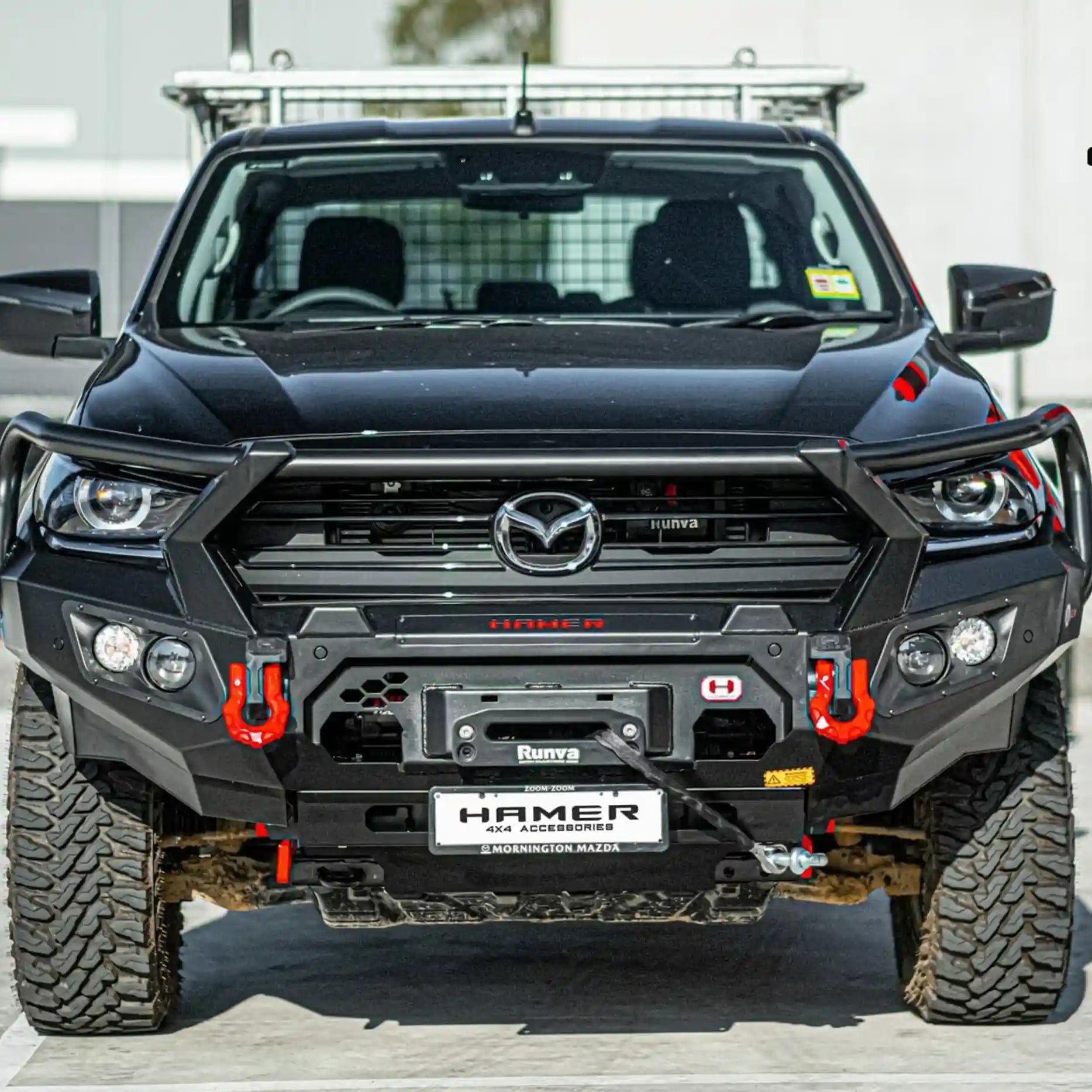 Angled front look of Mazda BT-50 (2021–2024) fitted with Hamer King Series Plus Bull Bar, steel build, winch ready and stylish fit.