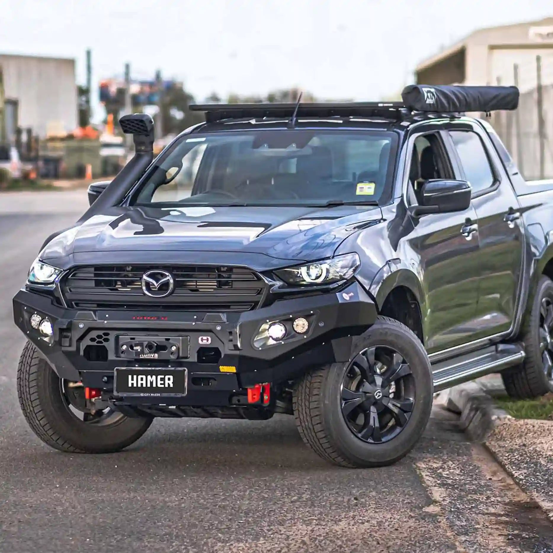 Right side view of Mazda BT-50 (2021–2024) with Hamer King Series Bull Bar, durable steel design with light bar slot and winch access.