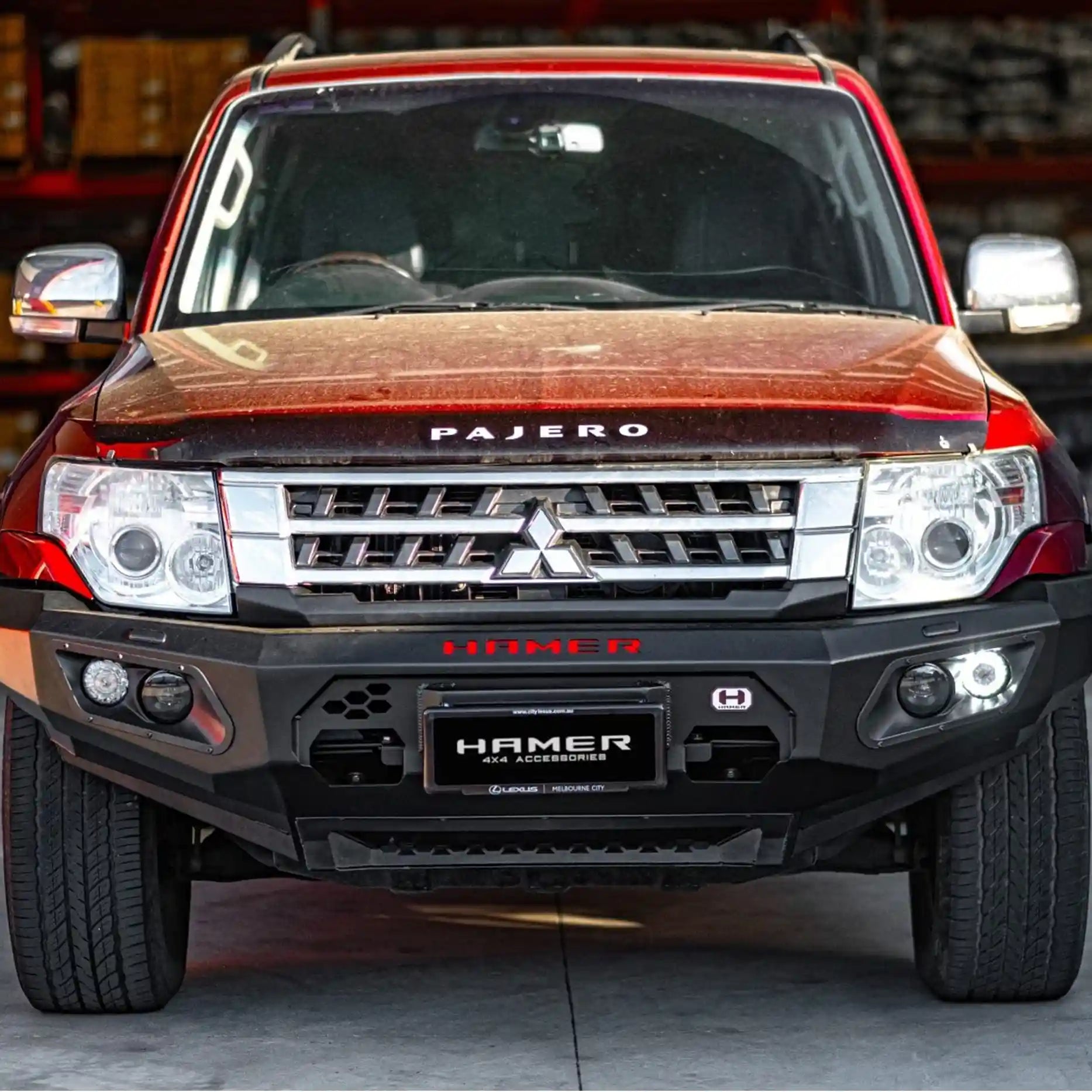 Front view of Mitsubishi Pajero (2006–2021) fitted with Hamer King Series Bull Bar, ADR compliant and winch ready with integrated LED lights.