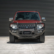Front view of Mitsubishi Pajero (2006–2021) fitted with Hamer King Series Plus Bull Bar, full bumper replacement with steel strength and ADR compliance.