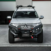 Front angle of Mitsubishi Pajero Sport QF (2020–Present) with Hamer King Bull Bar, a heavy-duty 3mm steel bumper replacement with winch compatibility and LED lighting.