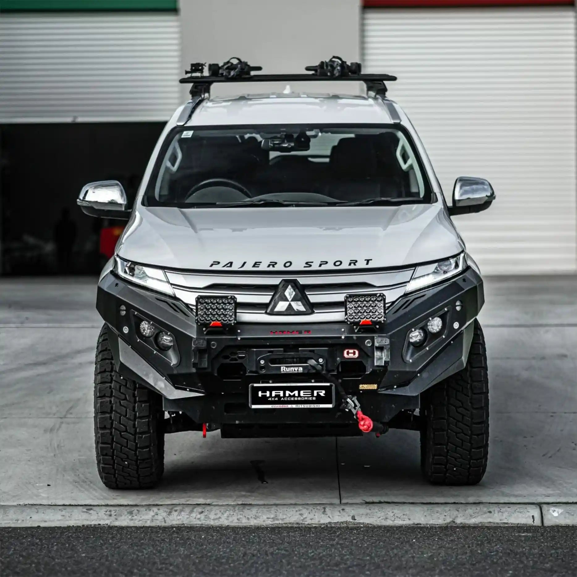 Front angle of Mitsubishi Pajero Sport QF (2020–Present) with Hamer King Bull Bar, a heavy-duty 3mm steel bumper replacement with winch compatibility and LED lighting.