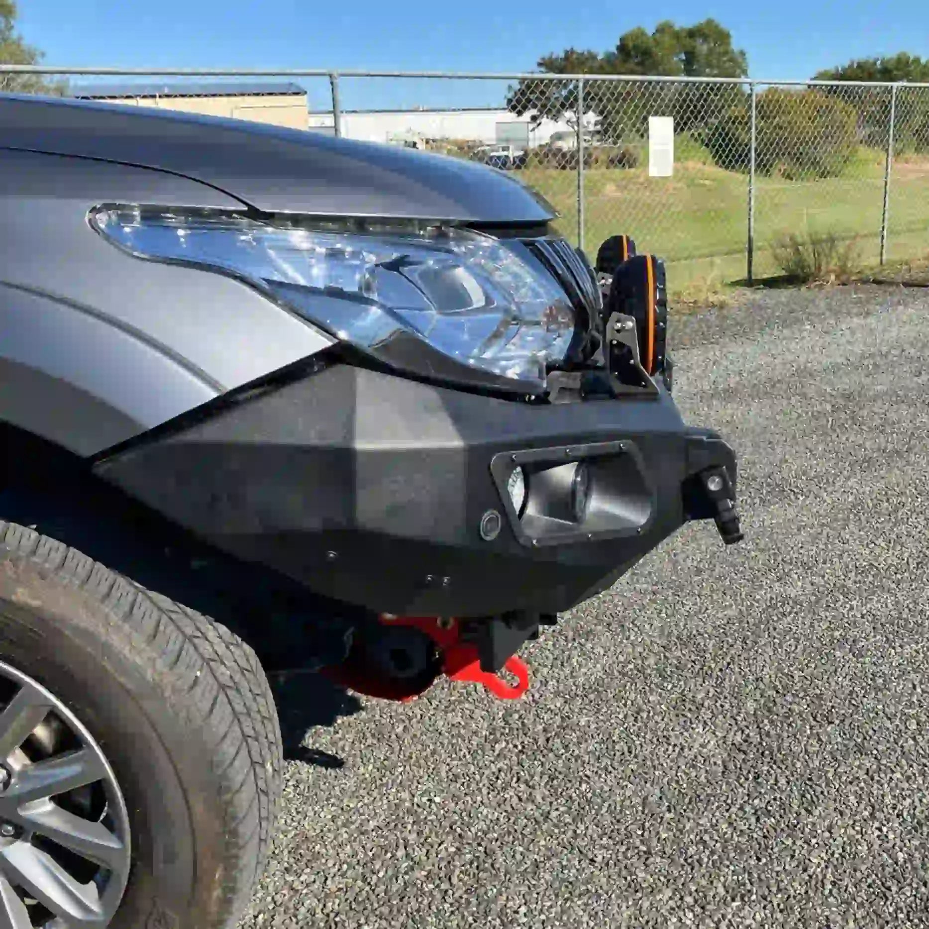 Left-side angle of Hamer King Series Bull Bar for Mitsubishi Triton MQ (2015–2018), featuring sleek integration and rugged matte black finish.