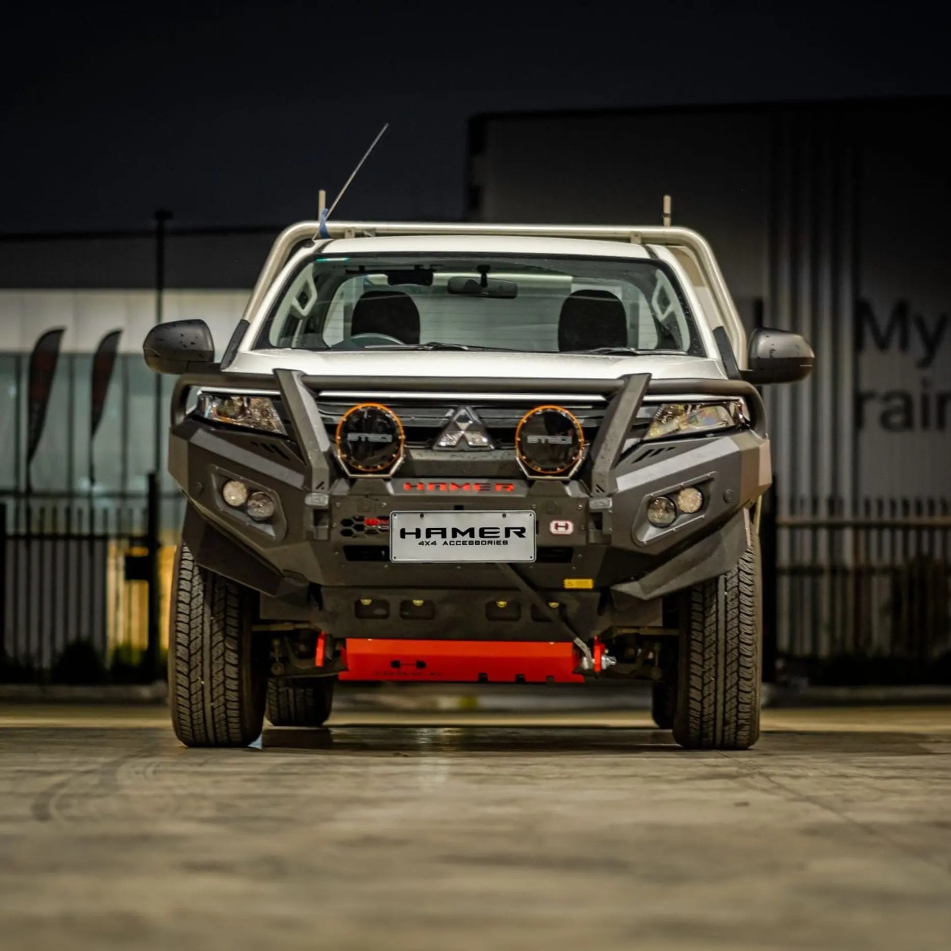 Front view of Mitsubishi Triton MR 2018 with Hamer King Plus Bull Bar, ADR compliant steel design with LED lights and winch setup.