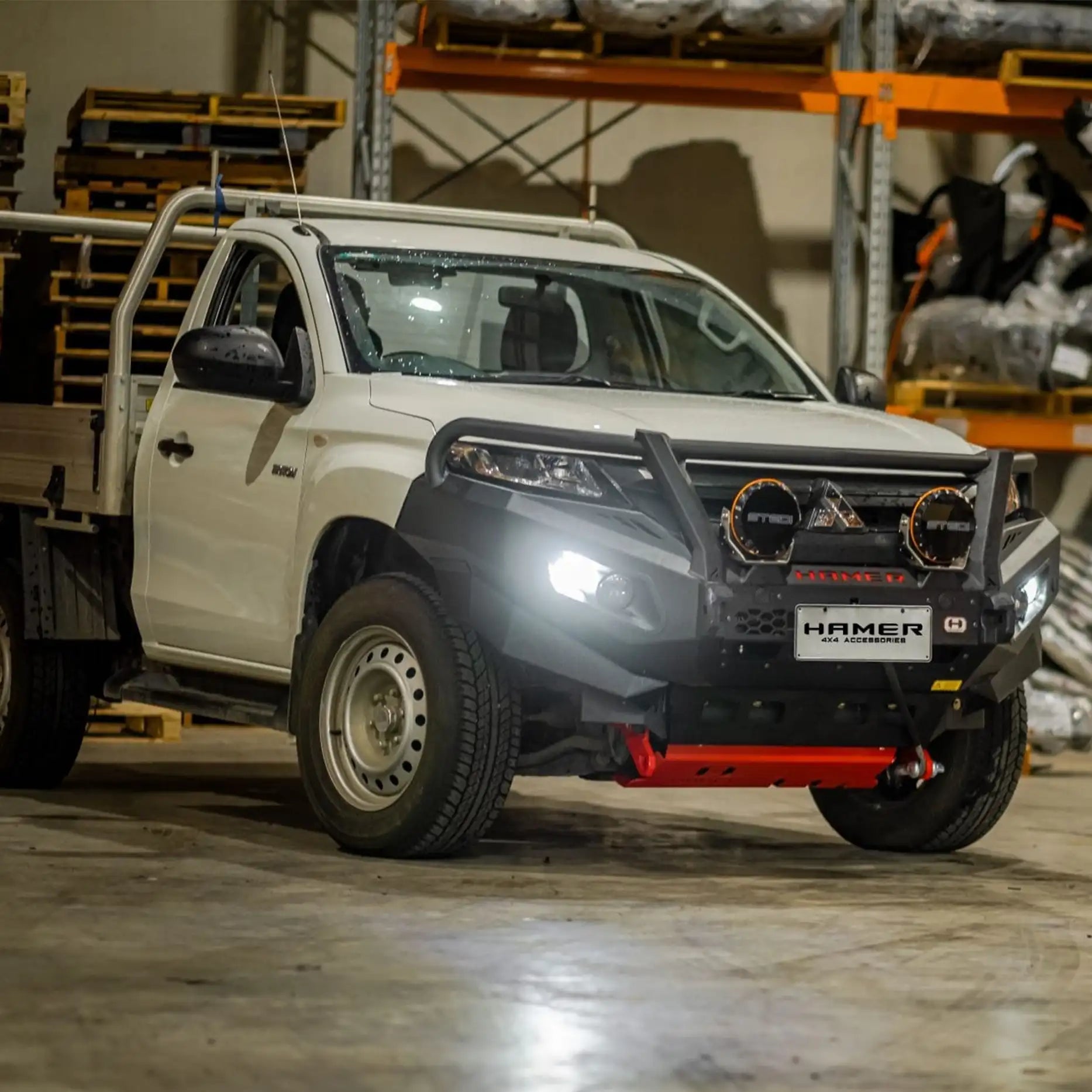 Left side angle of Triton MR showcasing Hamer King Plus Bull Bar, tough off-road ready bumper replacement with sleek integrated fit.