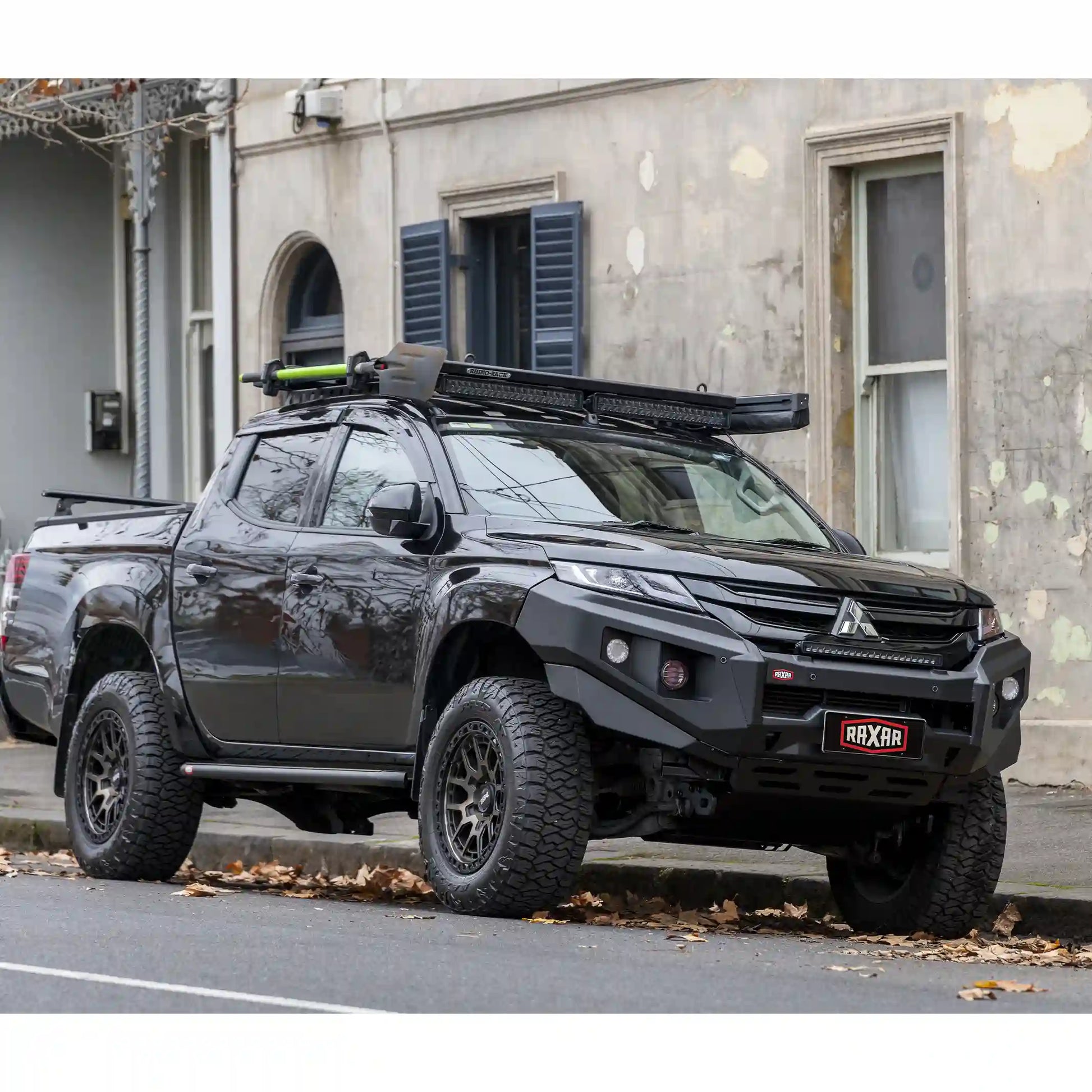 raxar no loop bull bar on mitsubishi triton mr left installed angle highlighting inner wing braces high lift jacking points driving light mounting provisions factory parking sensor compatibility and a sleek profile that preserves approach angles delivering strength safety and style for australian 4wd owners supplied by elevated 4x4