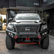Front view of Nissan Navara (2021–Present) fitted with Hamer King Bull Bar, a heavy-duty matte black bumper replacement with LED lights and recovery points.