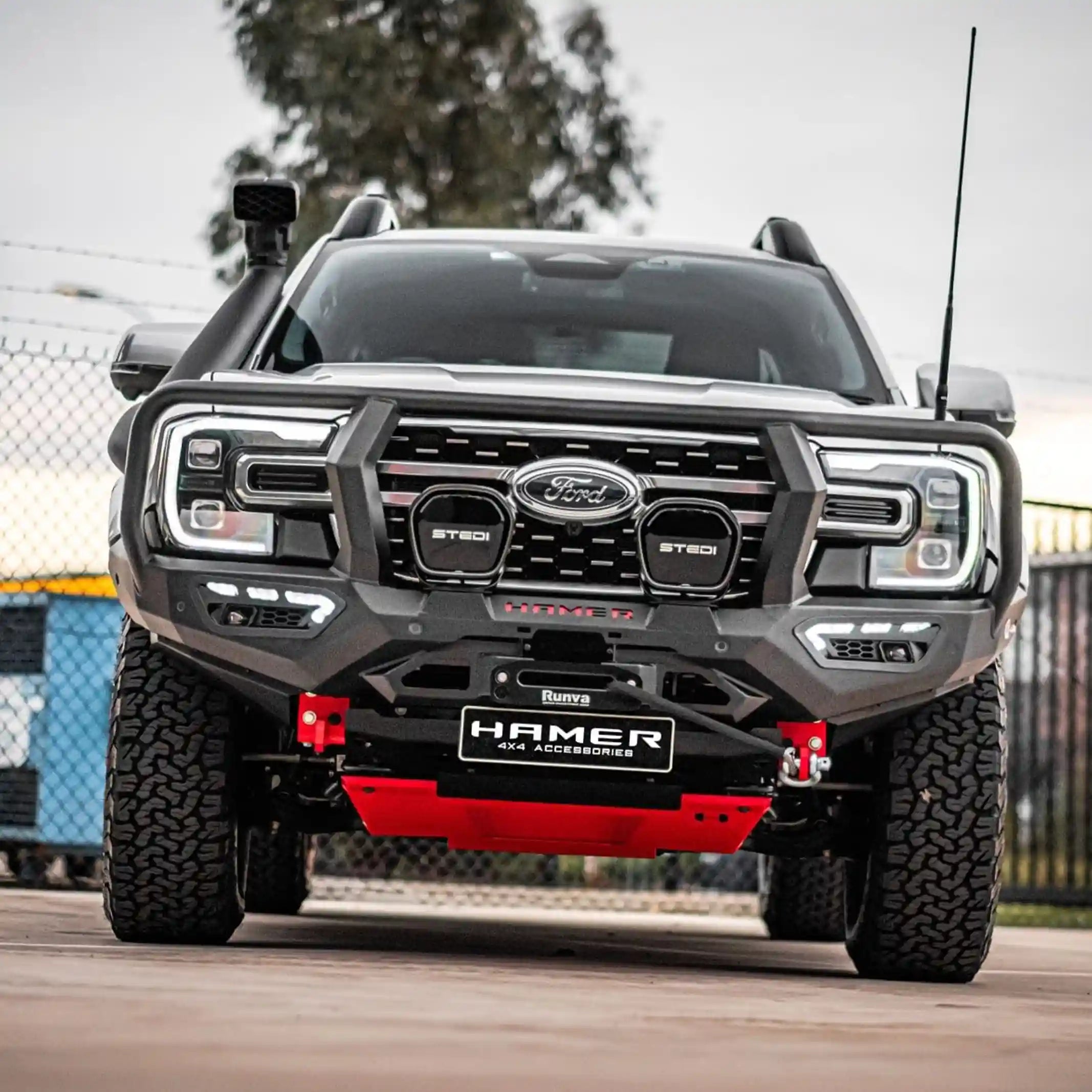 Front installed view of Atlas Series Plus Bull Bar in silver on Ford Ranger (2022–Present) by Elevated 4x4 Australia, showing full bumper replacement and LED lighting.