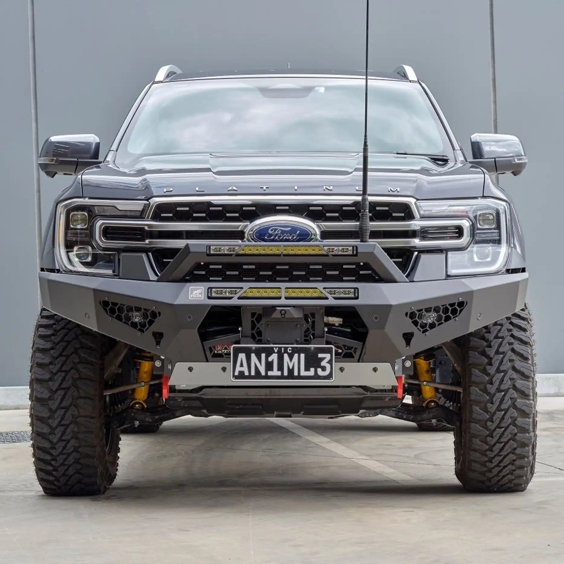 Close-up detail of the Offroad Animal Predator Bull Bar’s winch mount, airflow vents, and hi-lift jacking points, emphasizing its precision engineering and matte black powder-coated finish. Available from Elevated 4x4 Australia, this bull bar blends innovation, safety, and strength for Ford Ranger RA owners seeking unmatched off-road performance and style.
