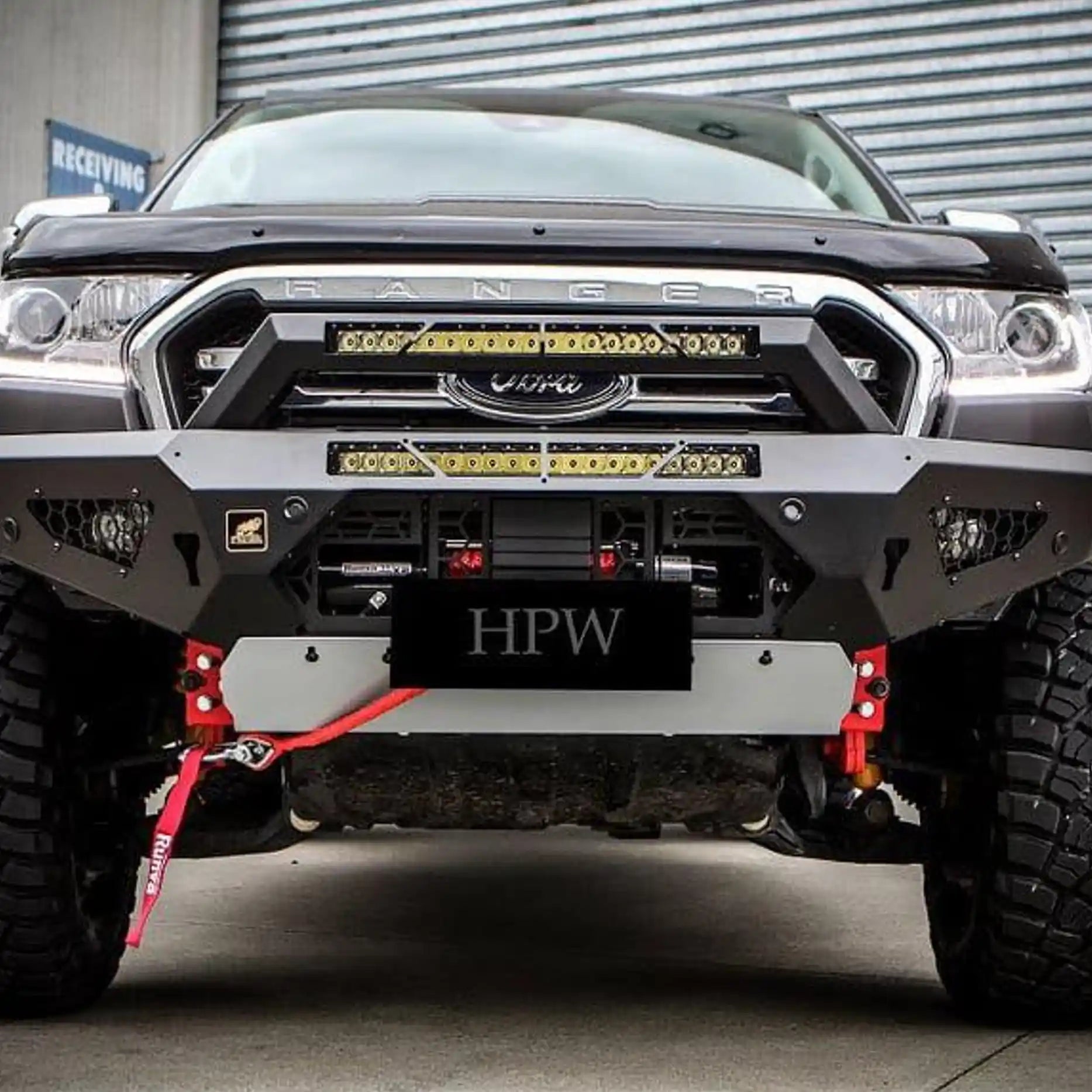 Installed front view of the Offroad Animal Predator Bull Bar on a Ford Ranger PX3, highlighting its aggressive matte black finish and compact bumper replacement design. This premium 4WD accessory from Elevated 4x4 enhances airflow, durability, and off-road protection while maintaining ADR compliance and a bold aesthetic fit for Australia’s toughest terrain.