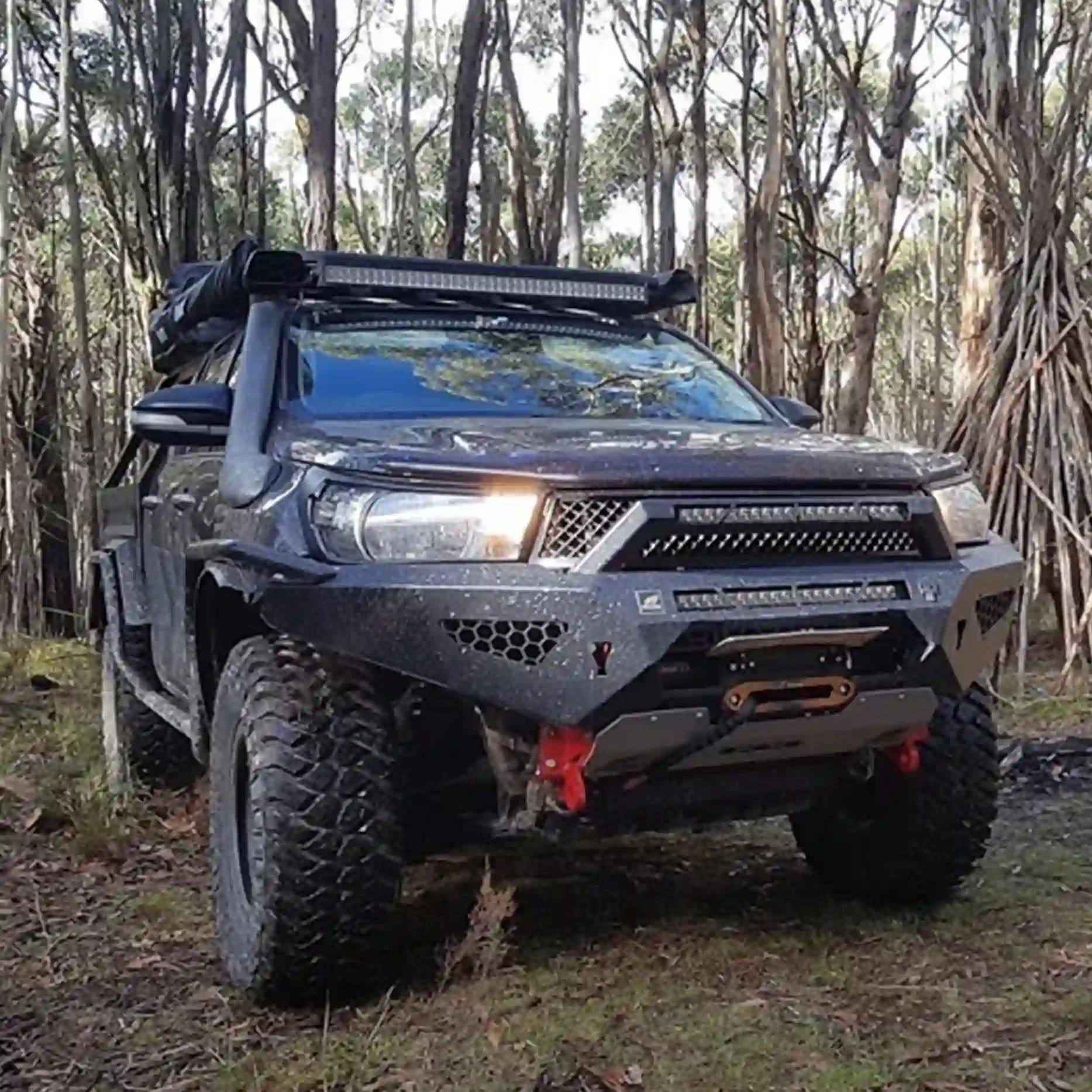 Right side view of the Offroad Animal Predator Bull Bar on the Toyota Hilux N80, displaying rugged tow points and a slim fit design for maximum clearance. Installed by Elevated 4x4, this bar combines safety, strength, and style—perfect for off-road touring around Newcastle and the Hunter region.