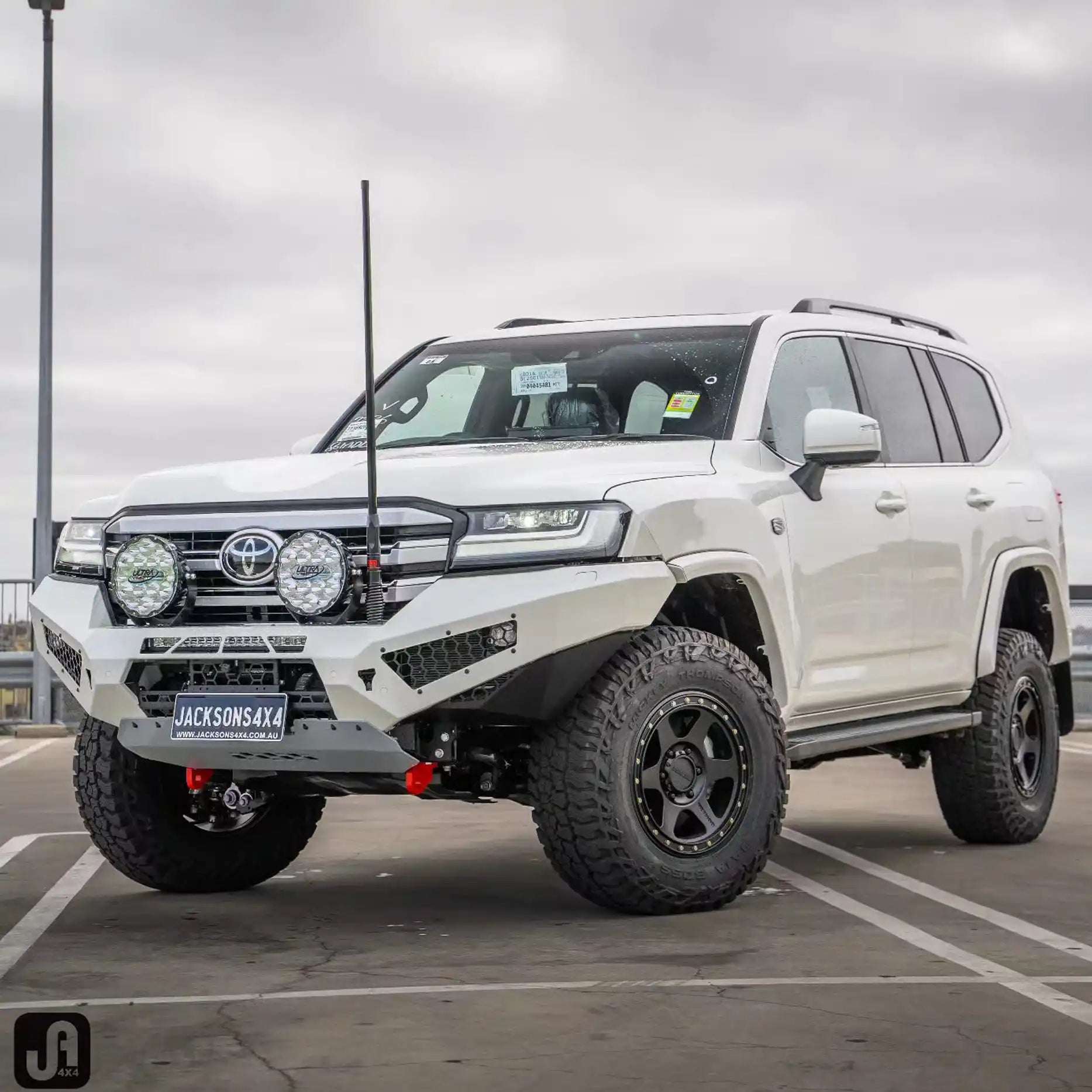 Toyota Land Cruiser 300 Series equipped with an Offroad Animal Predator Bull Bar tackling rugged off-road terrain, showing its strength and superior approach angle. Built and installed by Elevated 4x4, this bar gives unmatched confidence and aggressive aesthetics for adventure-ready 4WDs in the Hunter Region.