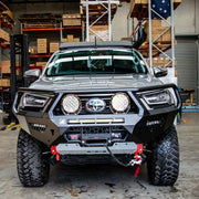 Front view of the Offroad Animal Toro Bull Bar on a Toyota Hilux N80 MY21, featuring a bold, full-width steel design with superior airflow and winch compatibility. Crafted for strength and style by Elevated 4x4, it delivers next-level off-road protection and rugged appeal for drivers across Newcastle and the Hunter Valley.