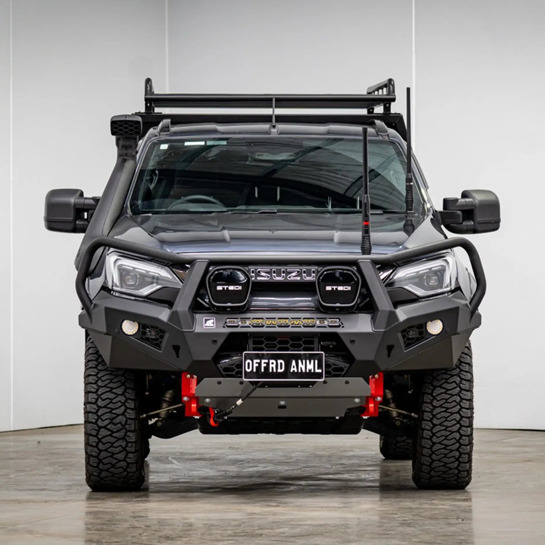 Front view of the Offroad Animal Toro Bull Bar installed on a 2024 Isuzu D-MAX facelift, finished in matte black by Elevated 4x4. Designed for superior airflow, winch and light integration, and ADR compliance, this front bar delivers unbeatable strength and sleek, aggressive styling — proving Elevated 4x4 is the go-to problem solver for serious off-road performance and safety.