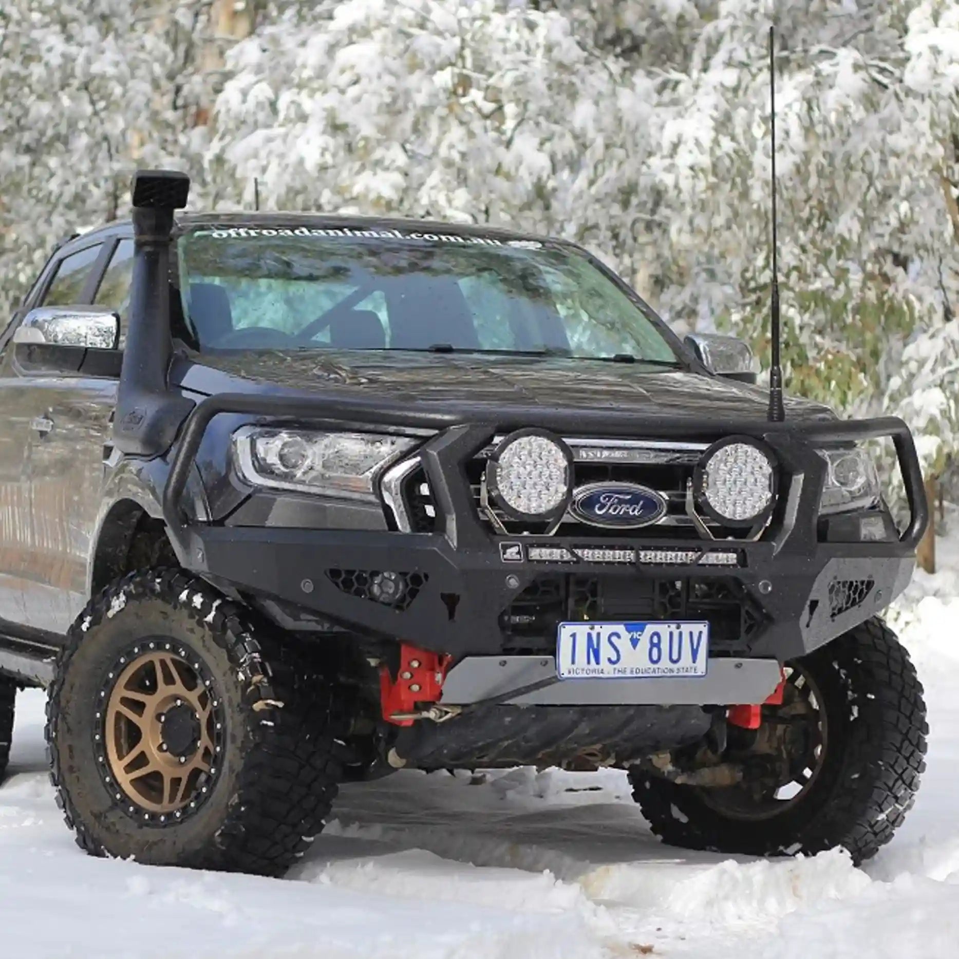 Installed front view of the Offroad Animal Toro Bull Bar on a Ford Ranger PX, showing its aggressive matte black design and premium build. This 4WD accessory from Elevated 4x4 enhances the Ranger’s tough off-road presence while improving airflow and protection. ADR compliant and winch-compatible, the Toro bar gives your Ranger a bold, functional upgrade perfect for Australian terrain and adventure enthusiasts.