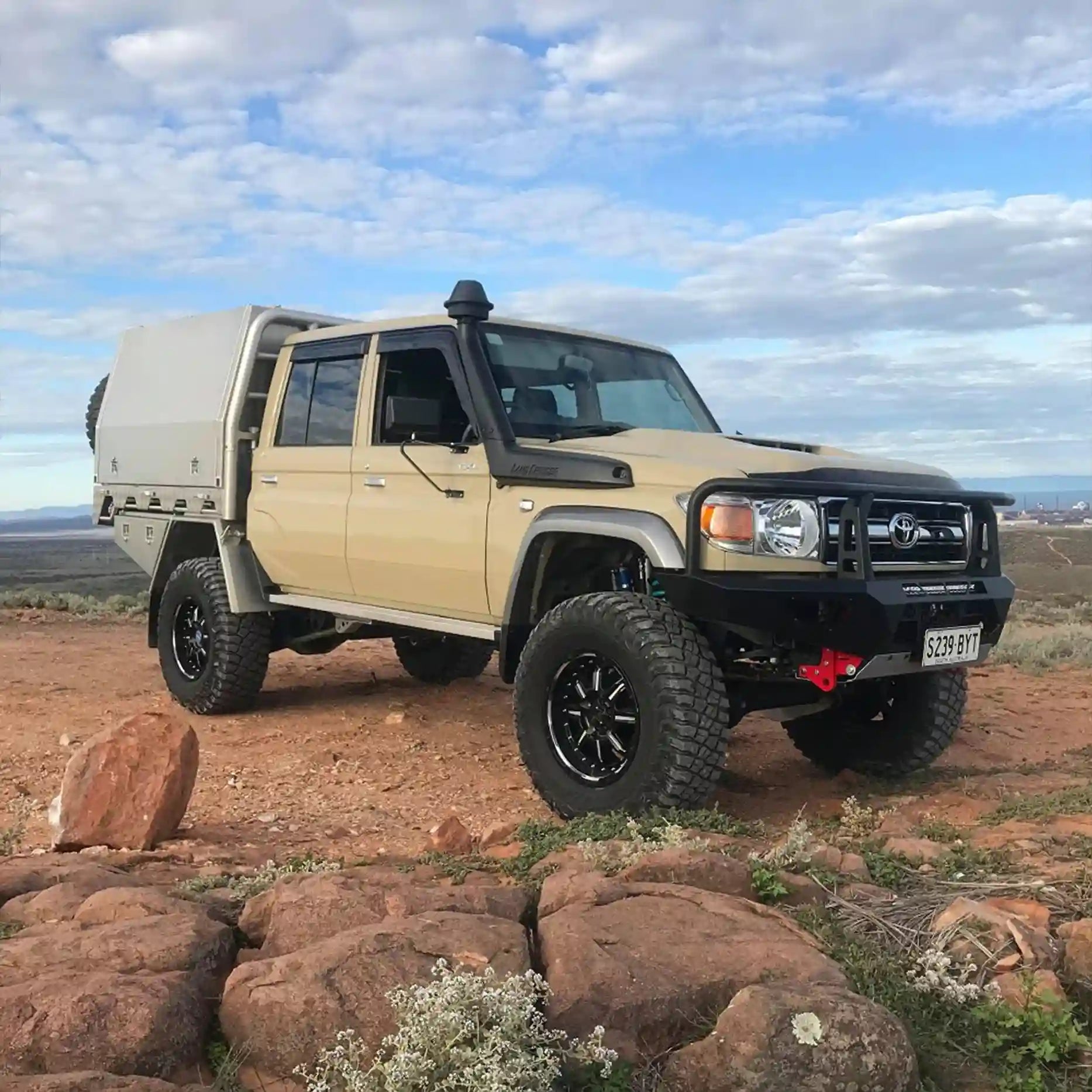 Off-road shot of the Offroad Animal Toro Bull Bar fitted to a Toyota Land Cruiser 78 Series, showcasing its rugged design and integrated recovery points in action. Built tough and supplied by Elevated 4x4, it’s engineered for serious 4WD adventures through Maitland, Rutherford, and beyond.