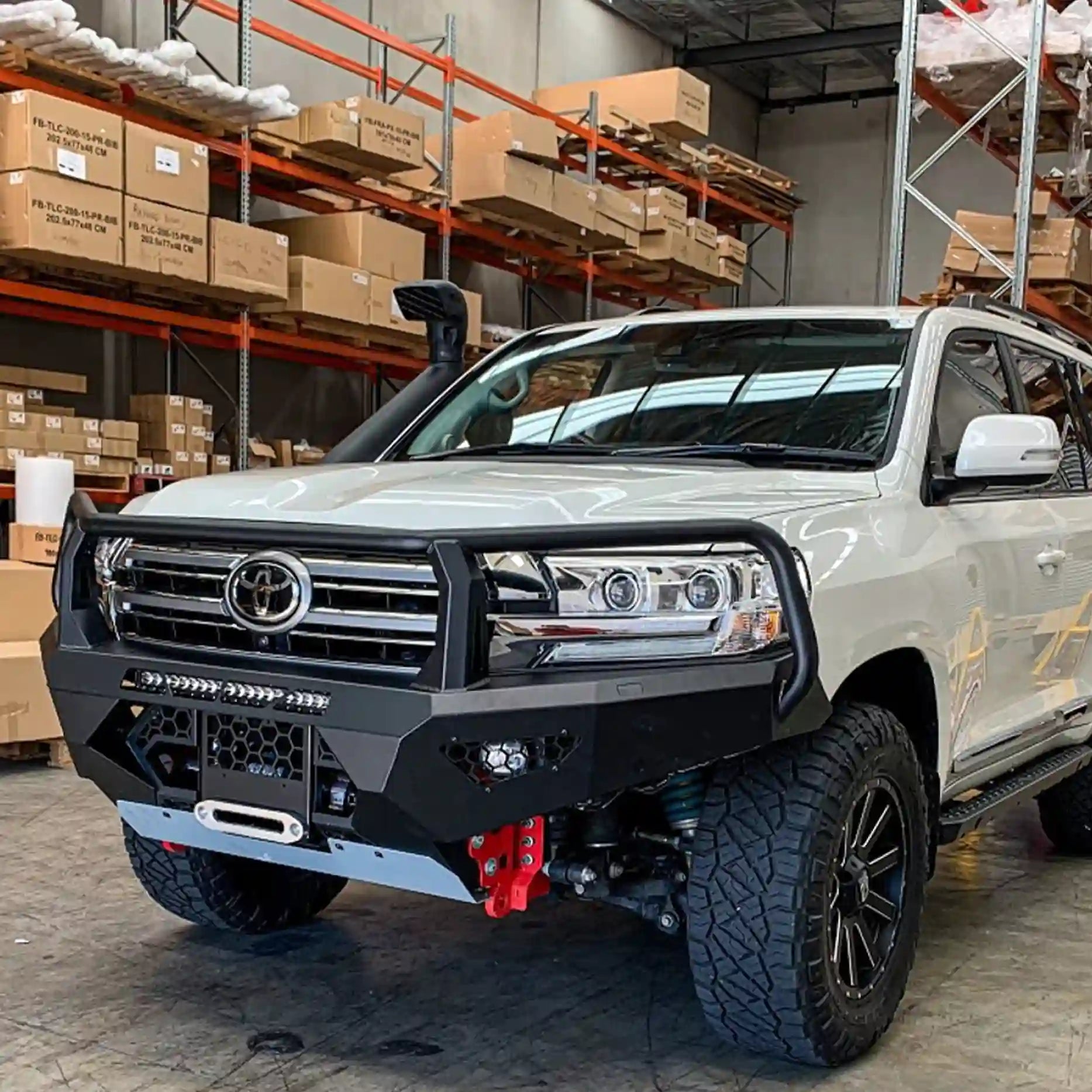 Left-side view of the Offroad Animal Toro Bull Bar fitted to a Toyota Land Cruiser 200 Series, highlighting its precision fitment, adaptive cruise compatibility and sleek styling. Expertly installed by Elevated 4x4, it enhances front-end strength and off-road performance for drivers around Maitland and Rutherford.