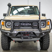Front view of the Offroad Animal Toro Bull Bar on a 2024 Toyota Land Cruiser 79 Series facelift, showcasing its bold top hoop, integrated light bar slot, and matte black powder-coated finish. Professionally fitted by Elevated 4x4, this premium bar delivers standout looks and protection for off-road enthusiasts across Newcastle, Maitland, and the Hunter Valley.