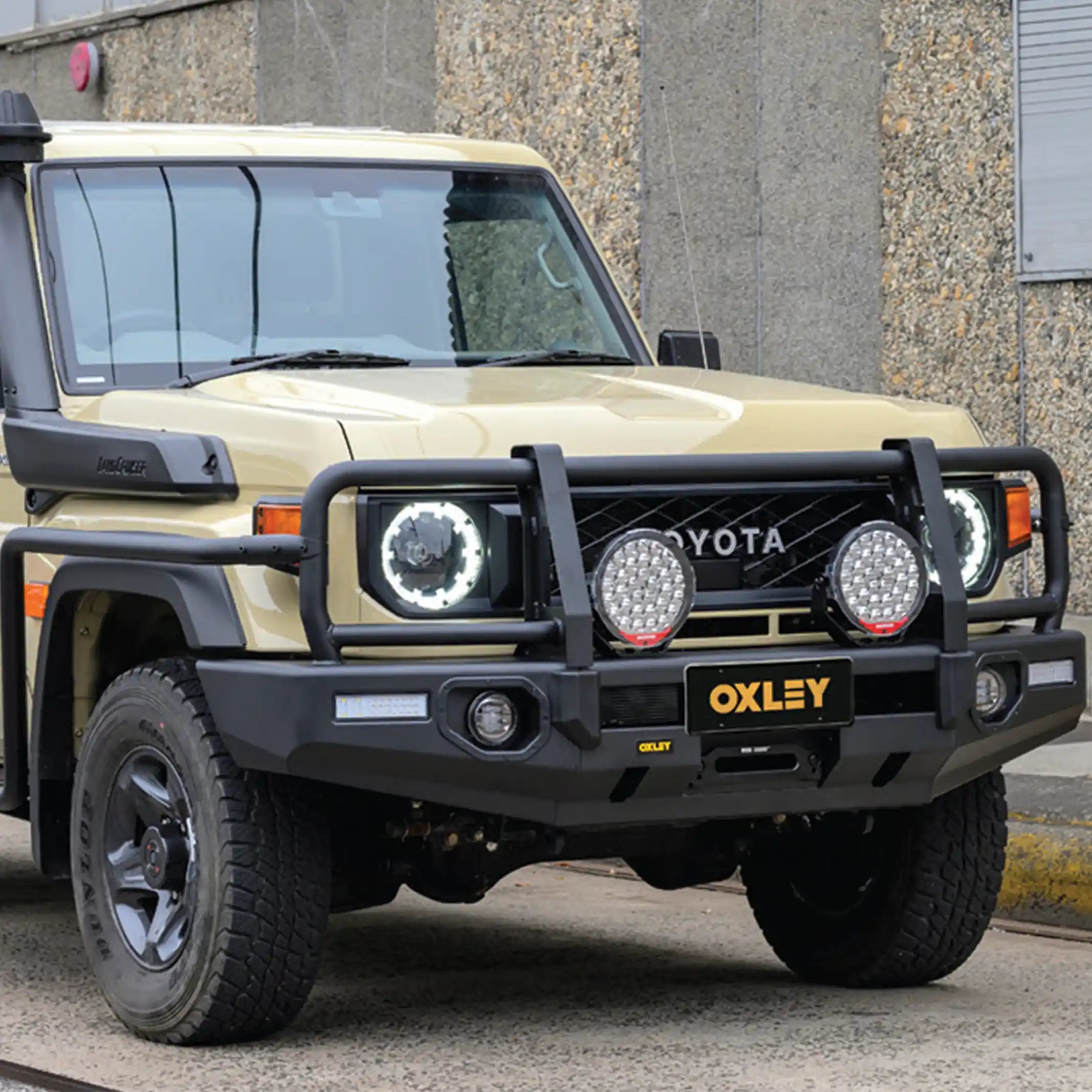 left side installed oxley bull bar toyota landcruiser 79 series single cab 2024 winch compatible durable finish elevated 4x4