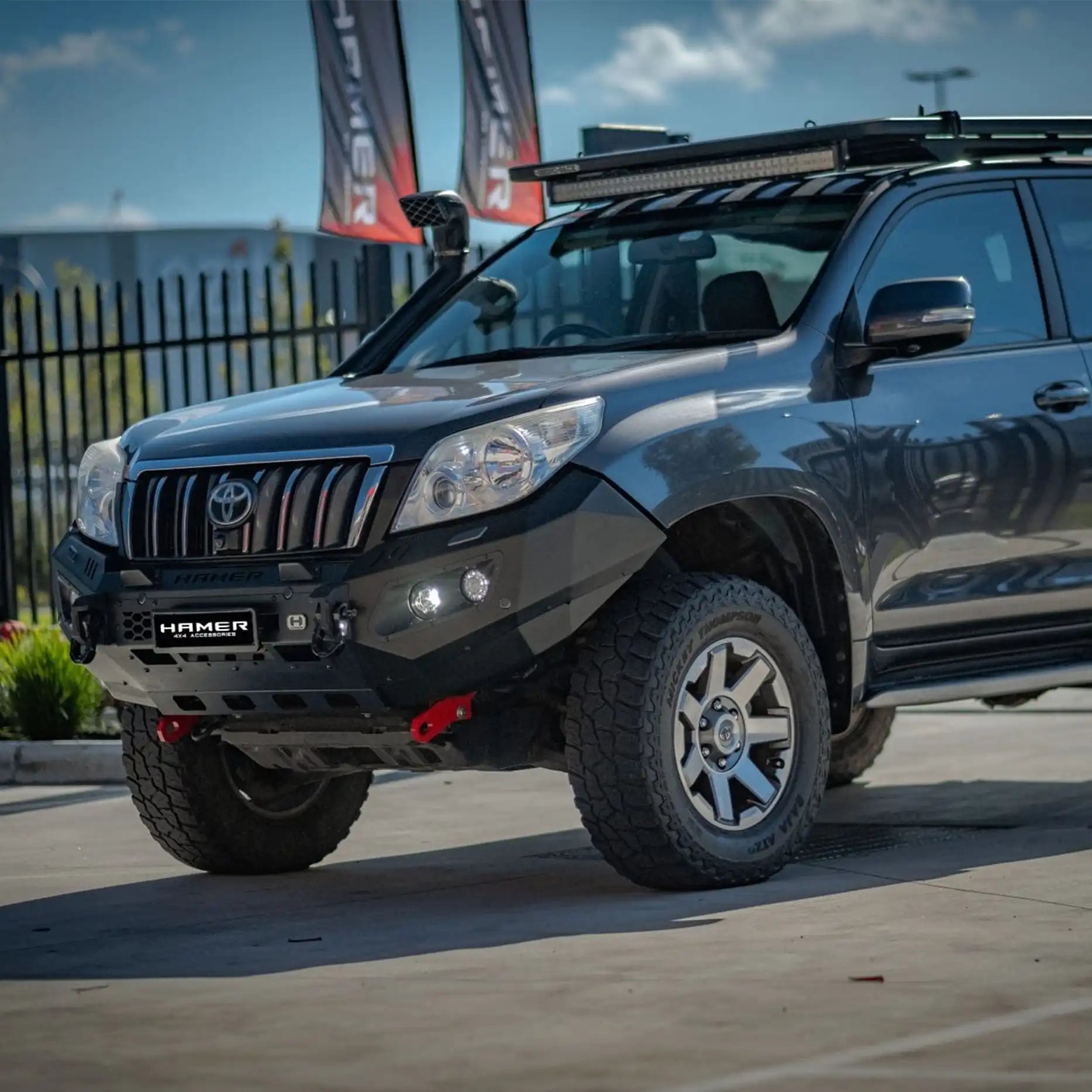 Right angle of Toyota Prado 150 (2009–2013) fitted with Hamer King Bull Bar, full bumper replacement in matte black finish.