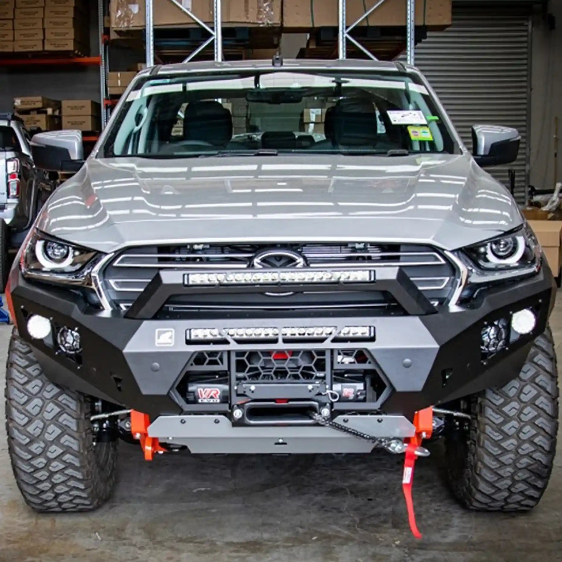 Front view of the Offroad Animal Predator Bull Bar installed on a Mazda BT-50 2021-on, showcasing its aggressive design, airflow efficiency, and winch-ready build. Elevated 4x4 delivers the ultimate front-end protection and performance solution for Australian 4WD owners who demand strength, safety, and standout style.