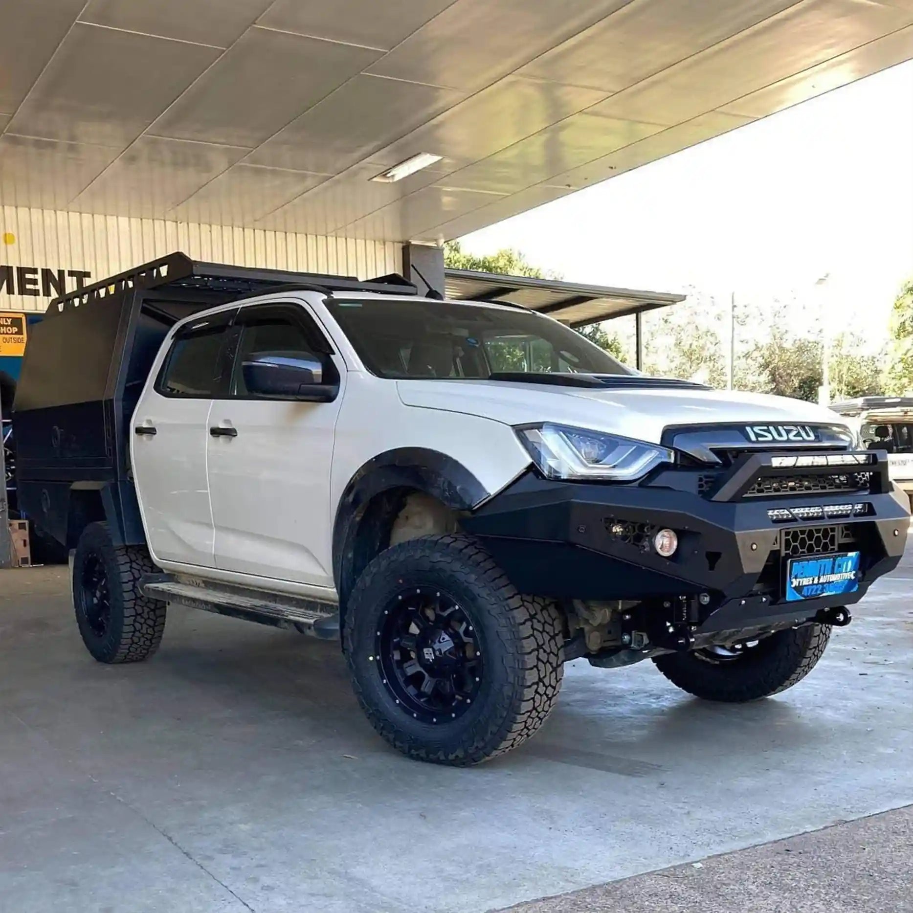 Left-angle view of the Offroad Animal Predator Bull Bar fitted to an Isuzu D-MAX X-Terrain, designed and installed by Elevated 4x4. This side profile highlights aggressive styling, premium airflow, and sensor compatibility — a problem-solving design tailored for Australian adventure seekers who demand both performance and protection.