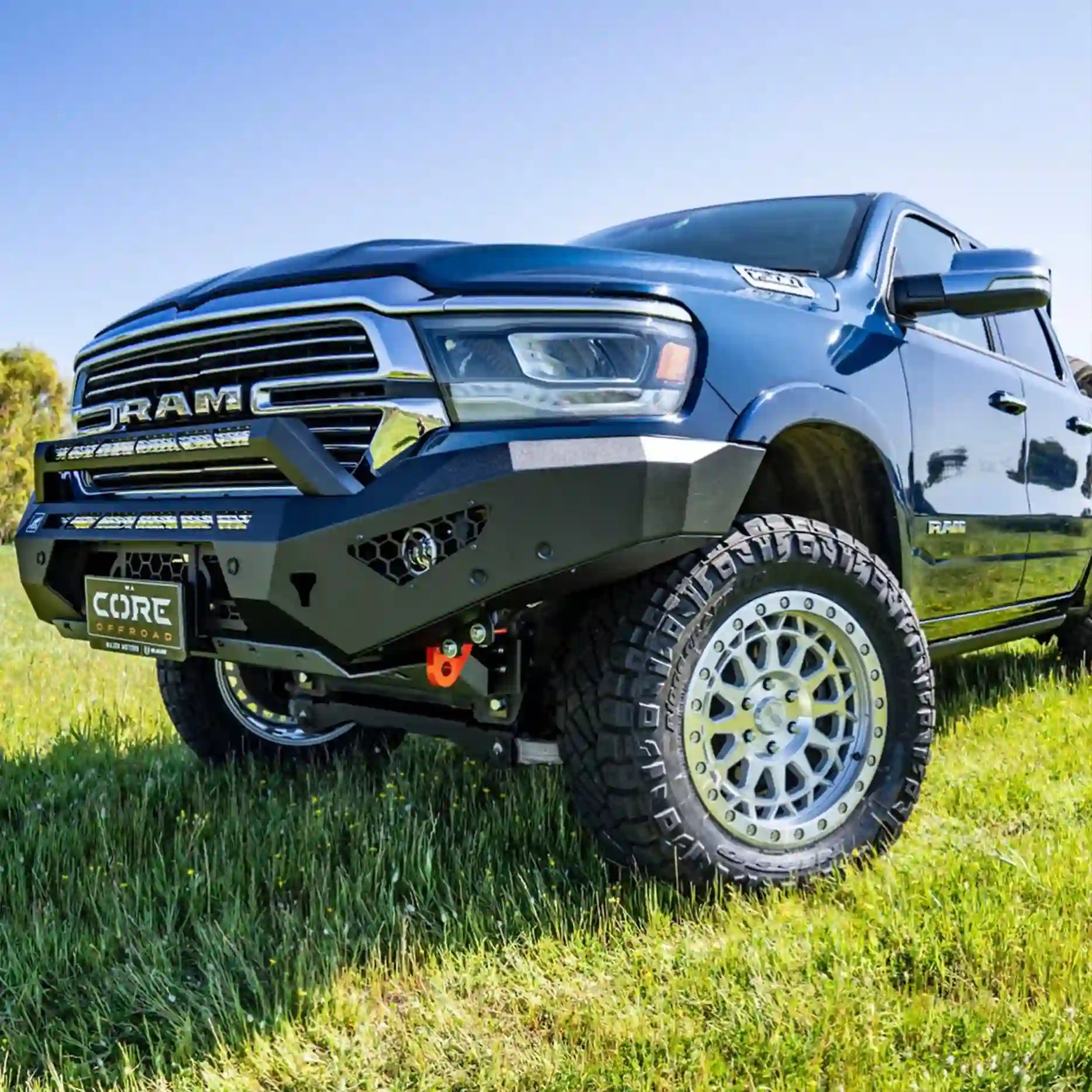 Left-angle view of the Offroad Animal Predator Bull Bar on a Ram 1500 DT, emphasizing its aerodynamic shape, matte-black finish, and precision engineering. Elevated 4x4 ensures superior fitment, integrated recovery points, and aggressive visual appeal built for Australian off-road environments.