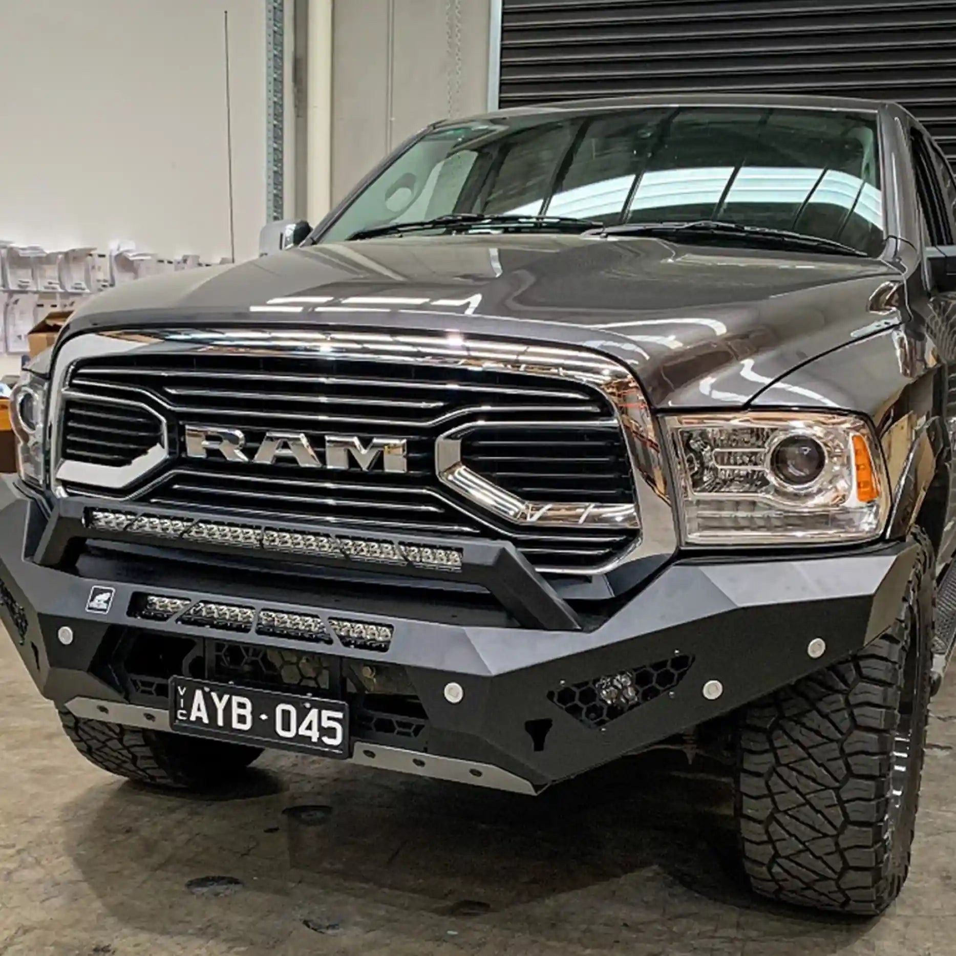 Left close-up of the Offroad Animal Predator Bull Bar on a Ram 1500 DS, showing its detailed steel craftsmanship and integrated recovery points. Elevated 4x4 ensures top-tier performance, ADR compliance, and rugged elegance — making it the go-to upgrade for Australian 4WD enthusiasts seeking protection and presence.