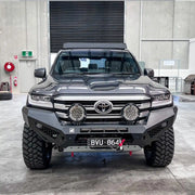 Front view of the Offroad Animal Predator Bull Bar on a Toyota Land Cruiser 300 Series, showcasing its aggressive design, integrated LED light bar mount, and matte black finish. Professionally installed by Elevated 4x4, this premium bull bar offers superior protection and airflow for off-road explorers across Newcastle and the Hunter Valley.