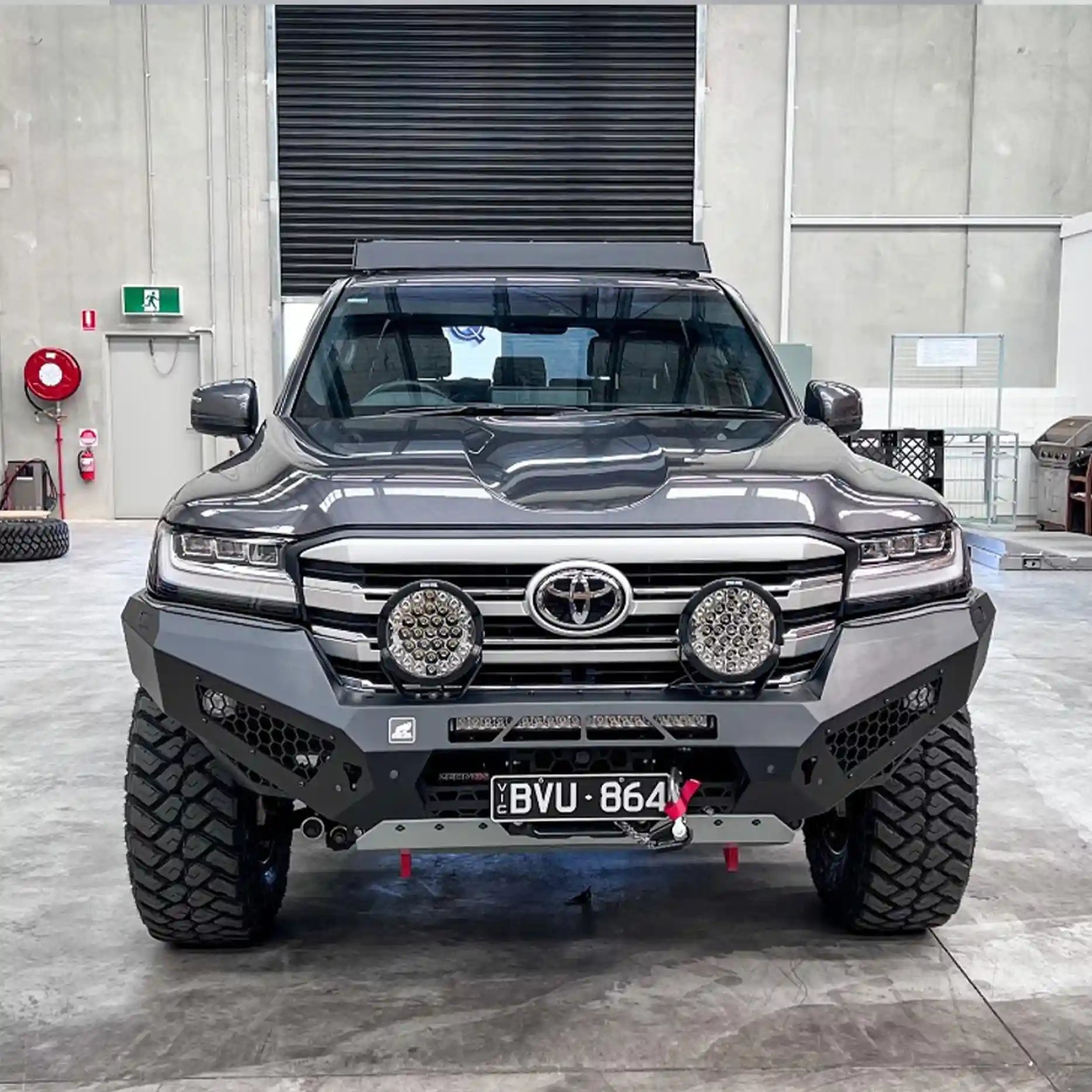 Front view of the Offroad Animal Predator Bull Bar on a Toyota Land Cruiser 300 Series, showcasing its aggressive design, integrated LED light bar mount, and matte black finish. Professionally installed by Elevated 4x4, this premium bull bar offers superior protection and airflow for off-road explorers across Newcastle and the Hunter Valley.