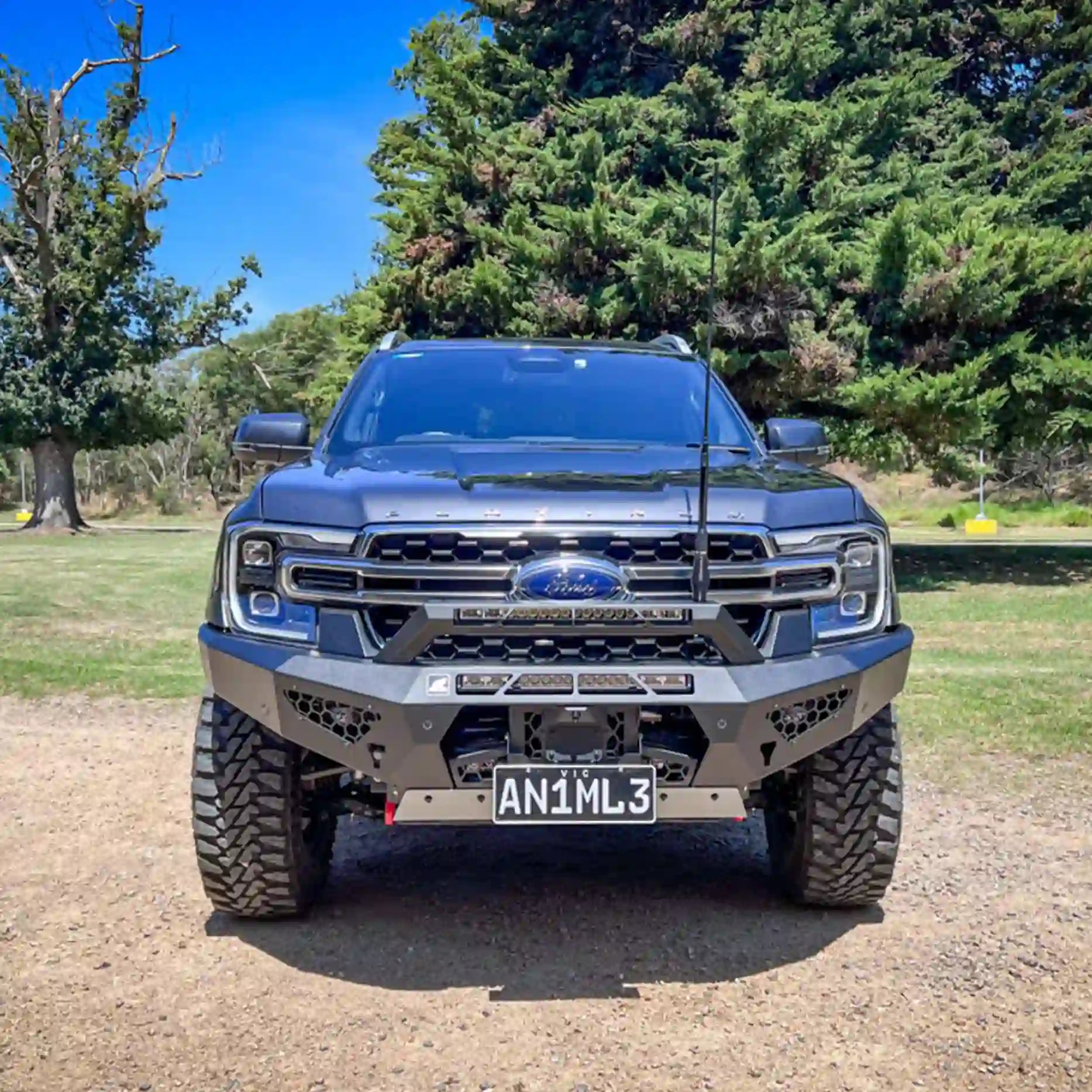 Right-angle perspective of the Offroad Animal Predator Bull Bar fitted on a 2022-on Ford Ranger RA, showcasing its precision-fit design and stealthy profile. Elevated 4x4’s installation highlights its rugged construction, integrated recovery points, and superior airflow for efficient engine cooling — a perfect blend of toughness and performance for Australian 4WD enthusiasts.