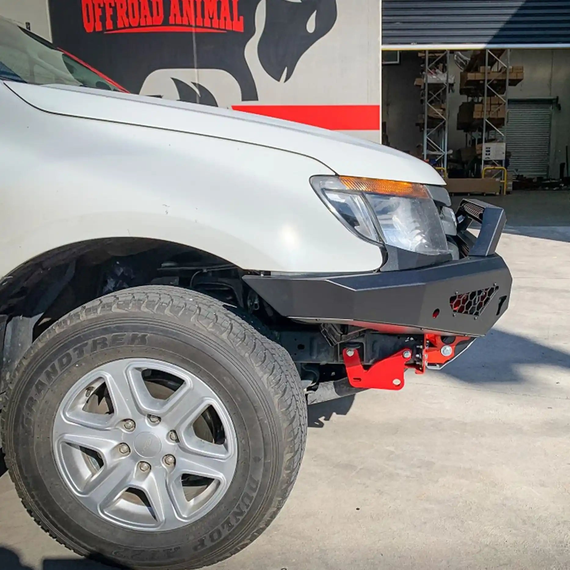 Right-angle installed view of the Offroad Animal Predator Bull Bar fitted to a Ford Ranger PX1, emphasizing its tough construction, aerodynamic fitment, and stylish matte black coating. Elevated 4x4 delivers this premium 4WD upgrade engineered for Australian conditions, offering durability, recovery readiness, and an unmistakably aggressive look.
