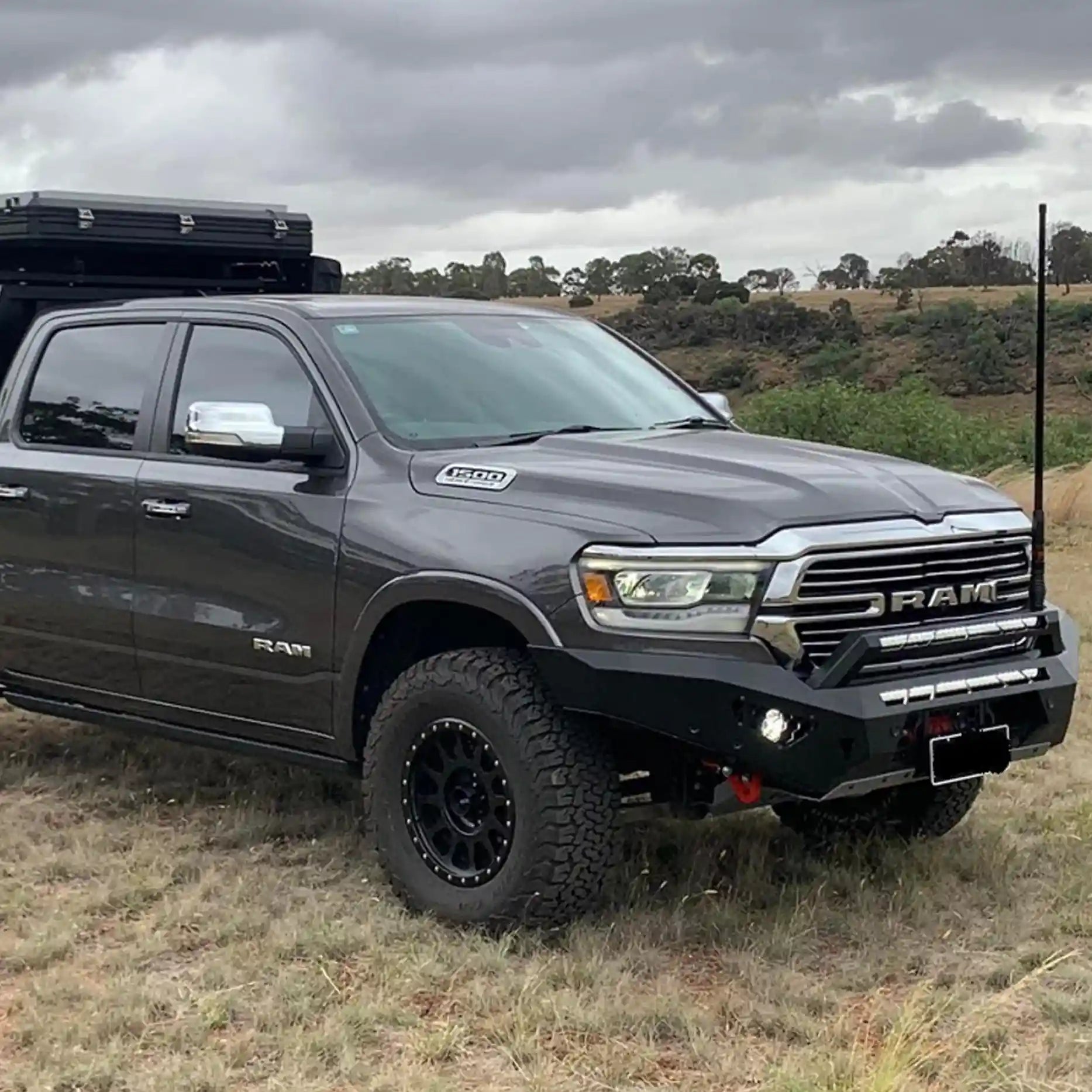 Right-side view of the Offroad Animal Predator Bull Bar installed on a Ram 1500 DT, showing its solid steel structure and airflow-optimized design. Built by Elevated 4x4, this setup enhances front-end strength, winch access, and bold style for tough off-road drives from Maitland to Nelson Bay.
