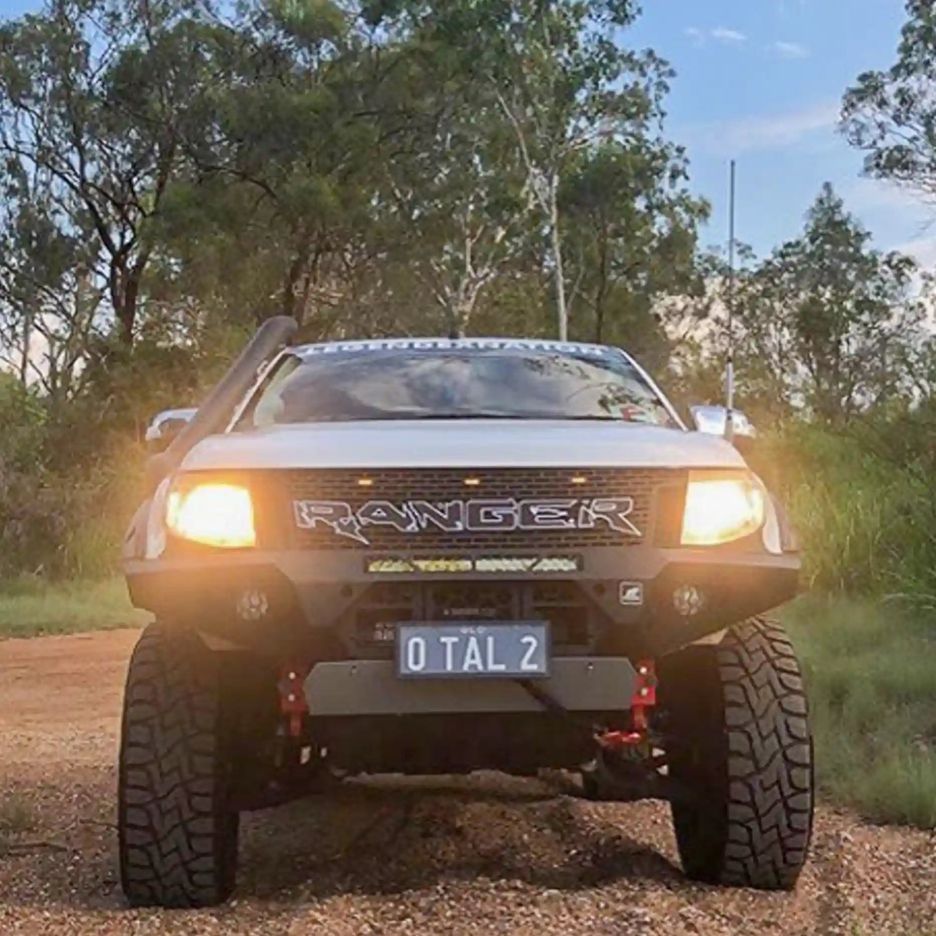 Offroad Animal Predator Bull Bar with optional top stealth hoop and 22-inch LED light bar installed on a Ford Ranger PX1. Elevated 4x4’s setup enhances visibility, airflow, and appearance while delivering off-road strength and ADR compliance. Perfect for Australian 4WD enthusiasts seeking function, safety, and unmatched style in one package.