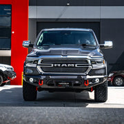 Front view of Ram 1500 DT (2021–Present) fitted with Hamer King Bull Bar, 3mm steel build, matte black finish and integrated LED lights.